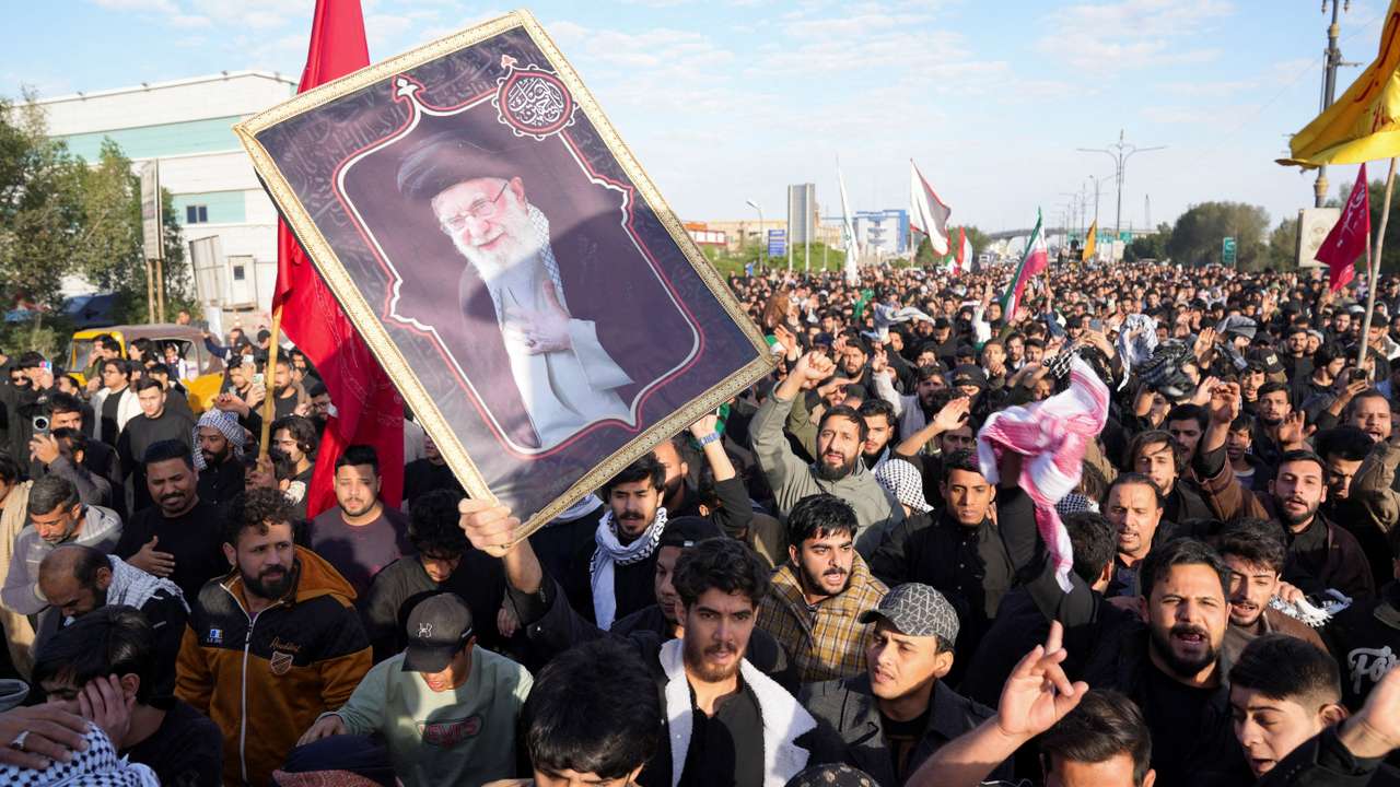 People march after Iran’s Supreme Leader Ayatollah Ali Khamenei was killed in Israeli and U.S. strikes, in Basra