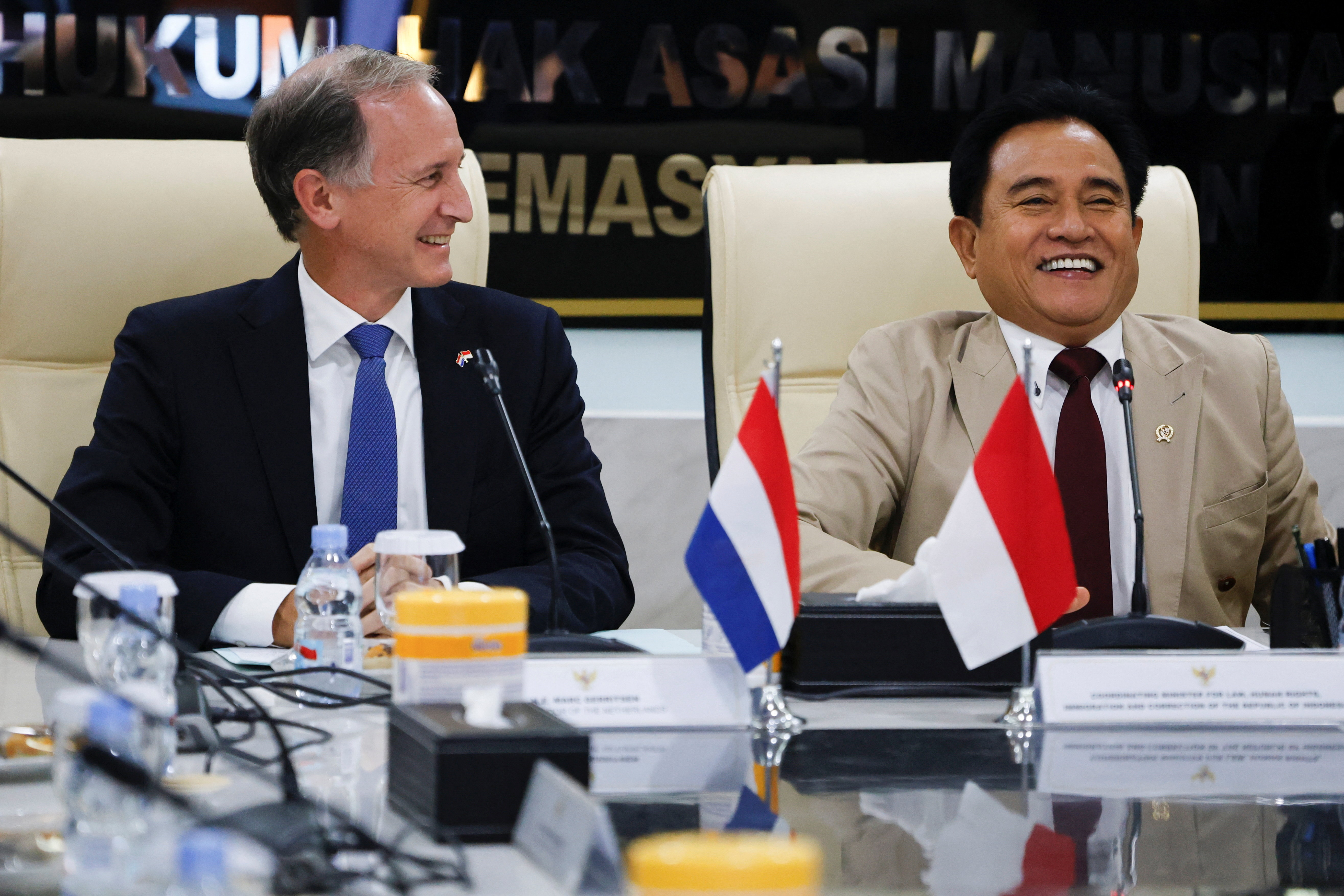 Indonesia's Chief Minister for Law and Human Rights, Yusril Ihza Mahendra and Marc Gerritsen Dutch Ambassador to Indonesia attend a meeting in Jakarta