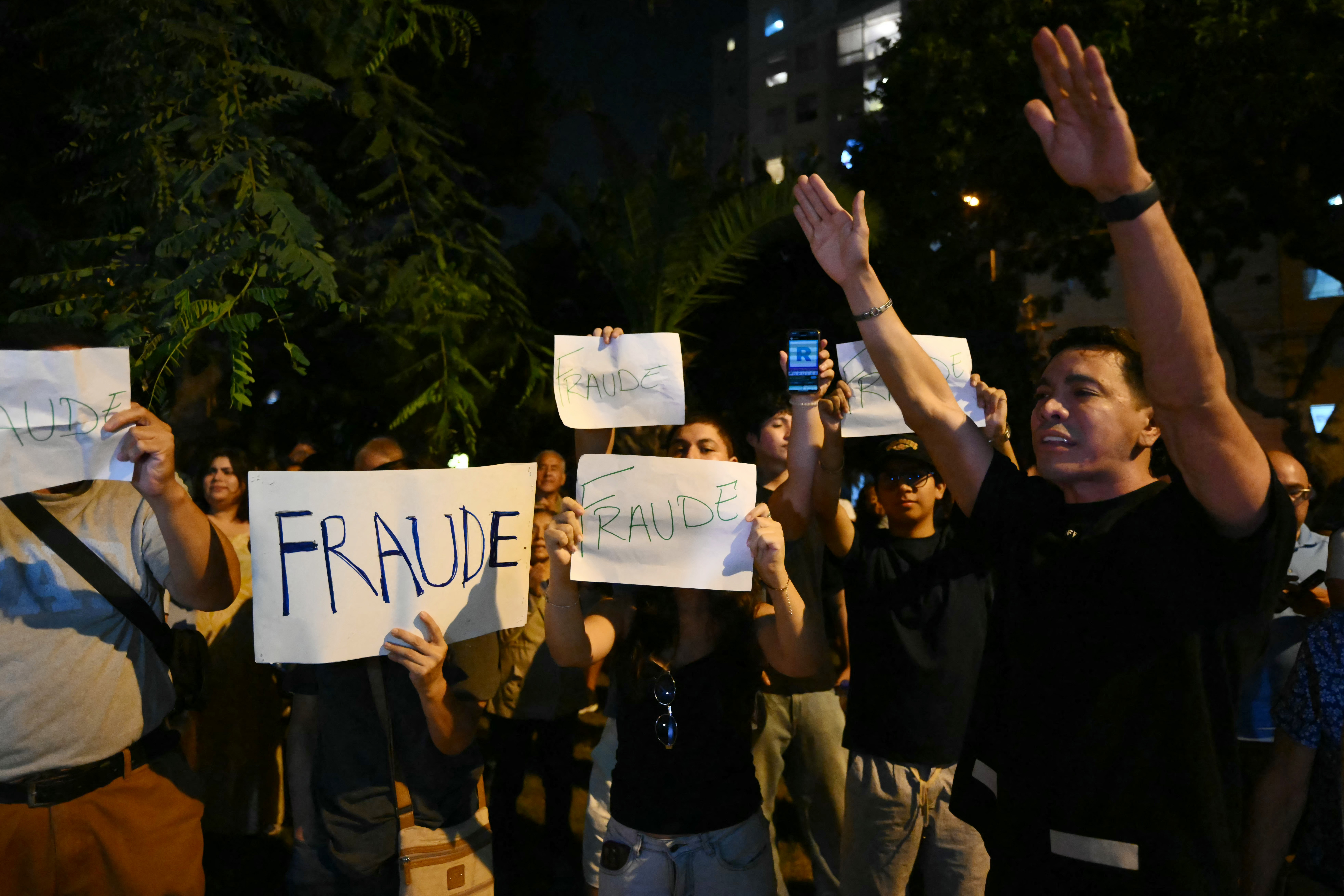 AFP__20260413__A7KE3MY__v1__HighRes__PeruElectionVoteProtest