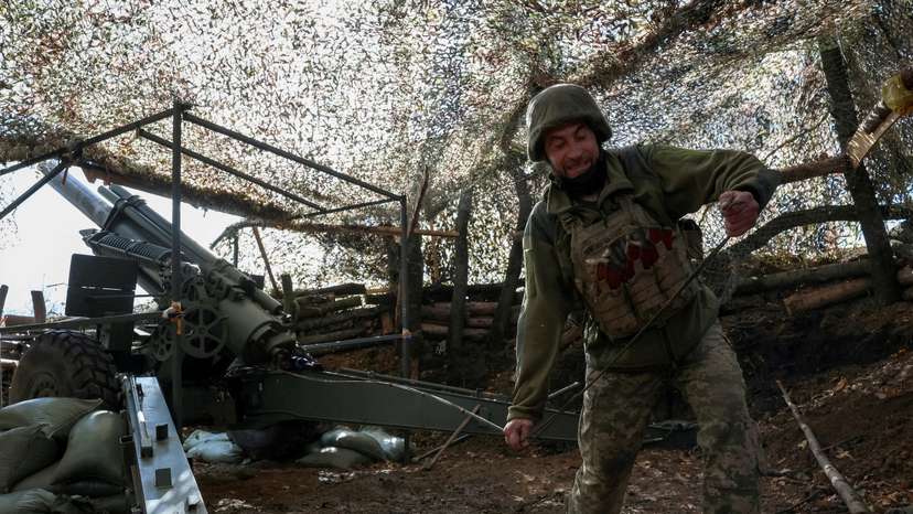Ukrainian serviceman fires howitzer towards Russian troops near the frontline town of Pokrovsk