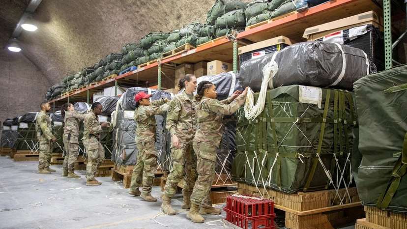 FILE PHOTO: U.S. Air Force members work on the preparation of a humanitarian aid drop for Gaza residents