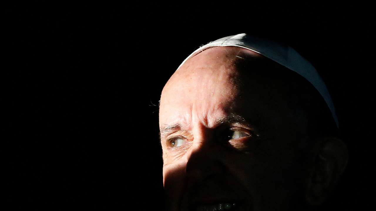 FILE PHOTO: Pope Francis looks on at the end of his pastoral visit at the parish church "Santa Maria dell'Orazione" at Setteville di Guidonia neighborhood of Rome
