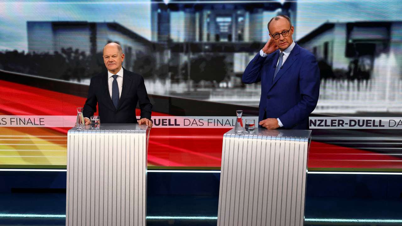 FILE PHOTO: German Chancellor Scholz and CDU candidate for chancellor, Merz debate on Welt TV, in Berlin