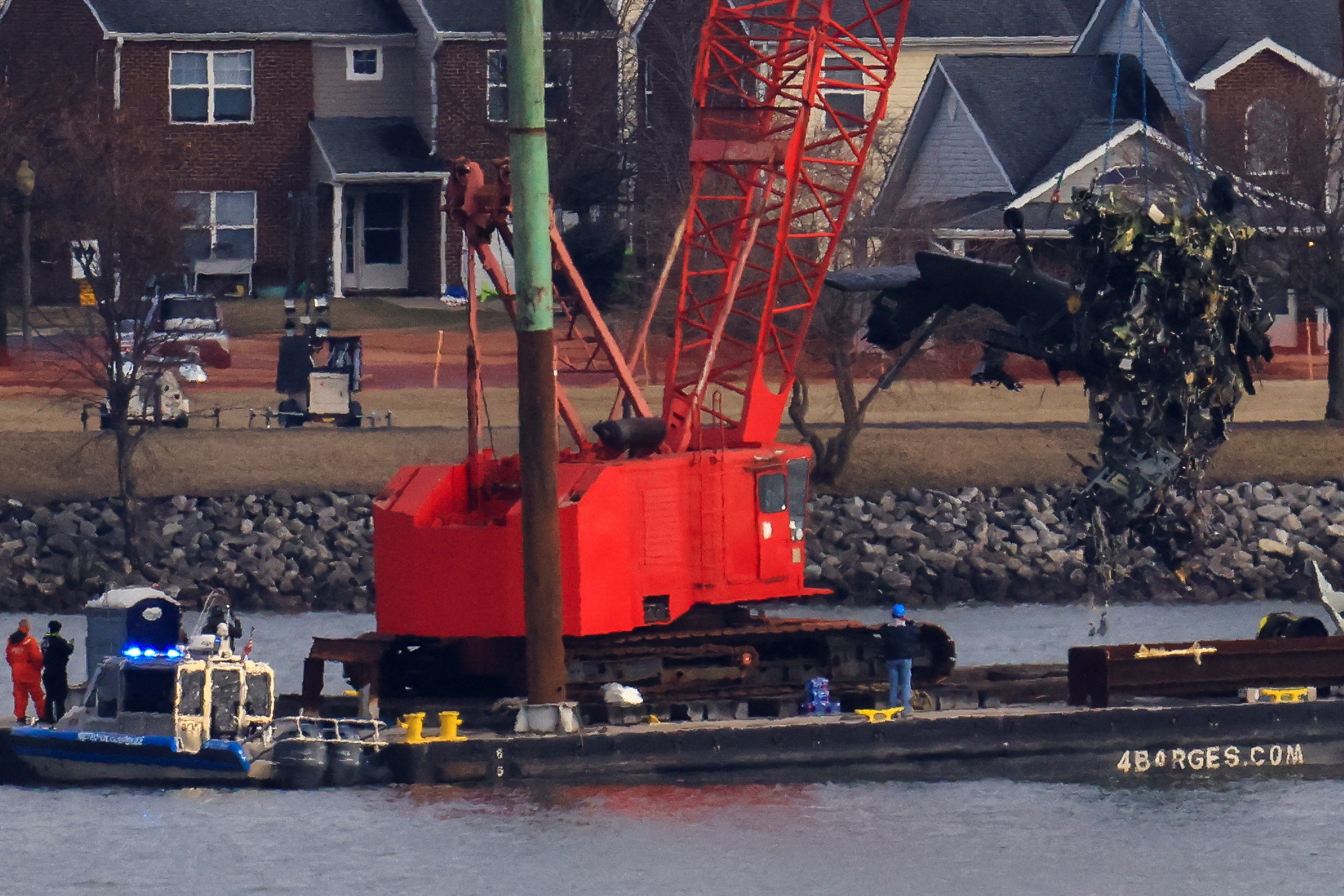 Aftermath of American Eagle flight 5342 crash in the Potomac River near Ronald Reagan Washington National Airport