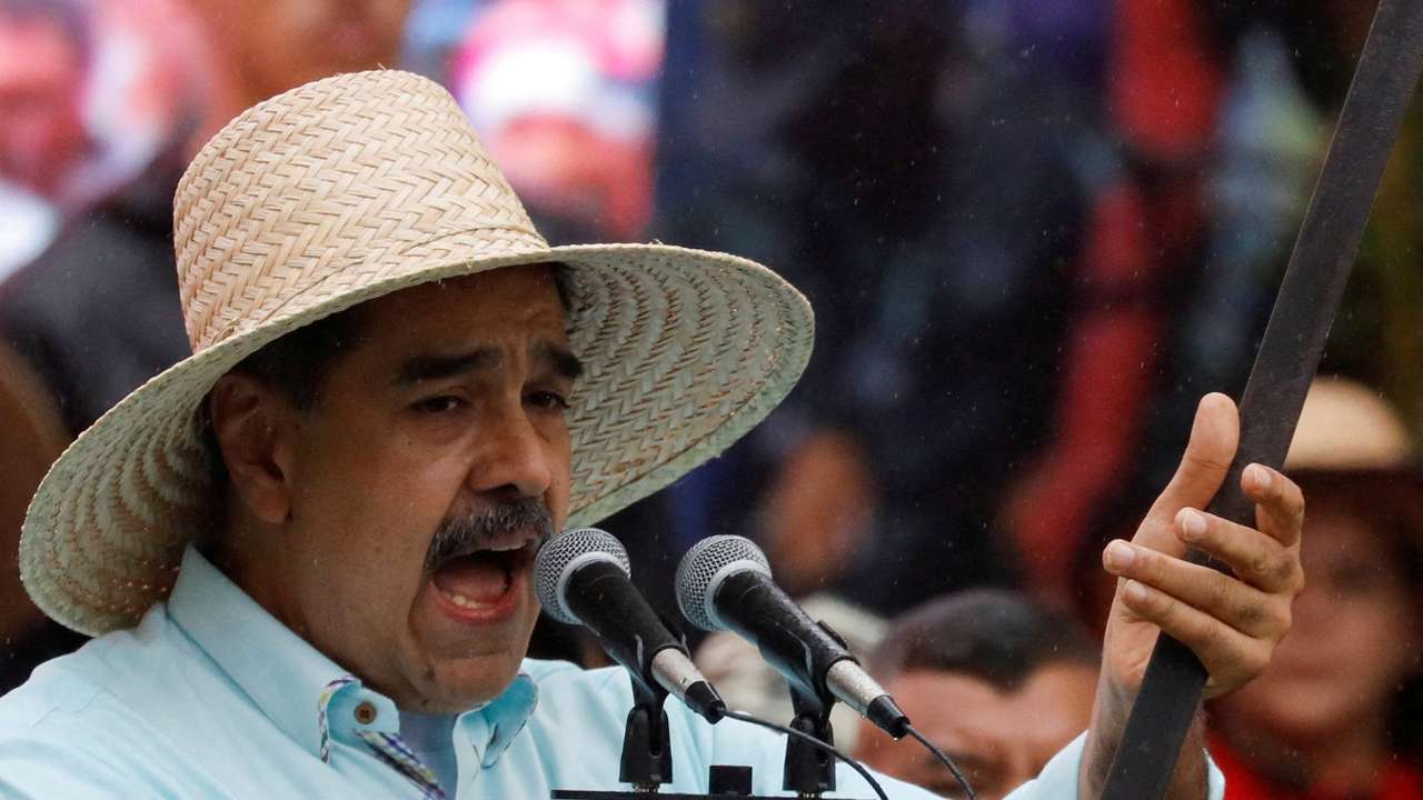 FILE PHOTO: Government supporters march to commemorate the Battle of Santa Ines, in Caracas