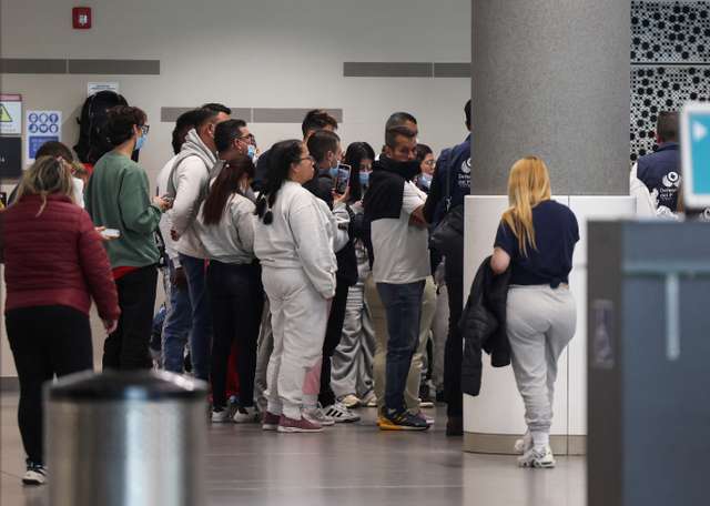 Colombians deported from the United States arrive at El Dorado International Airport in Bogota