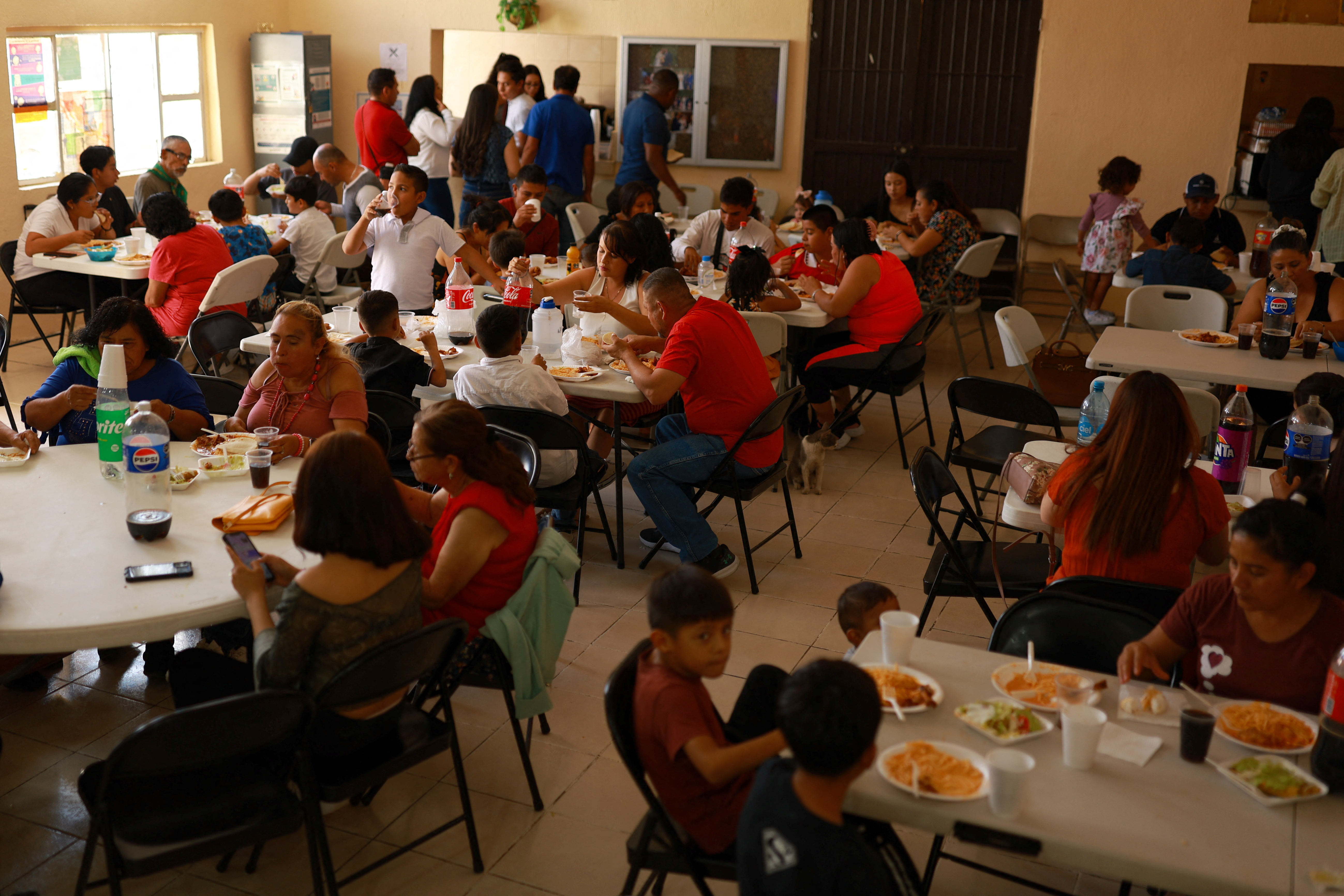 Asylum seekers in Ciudad Juarez after U.S. President Joe Biden announced a sweeping border security enforcement effort
