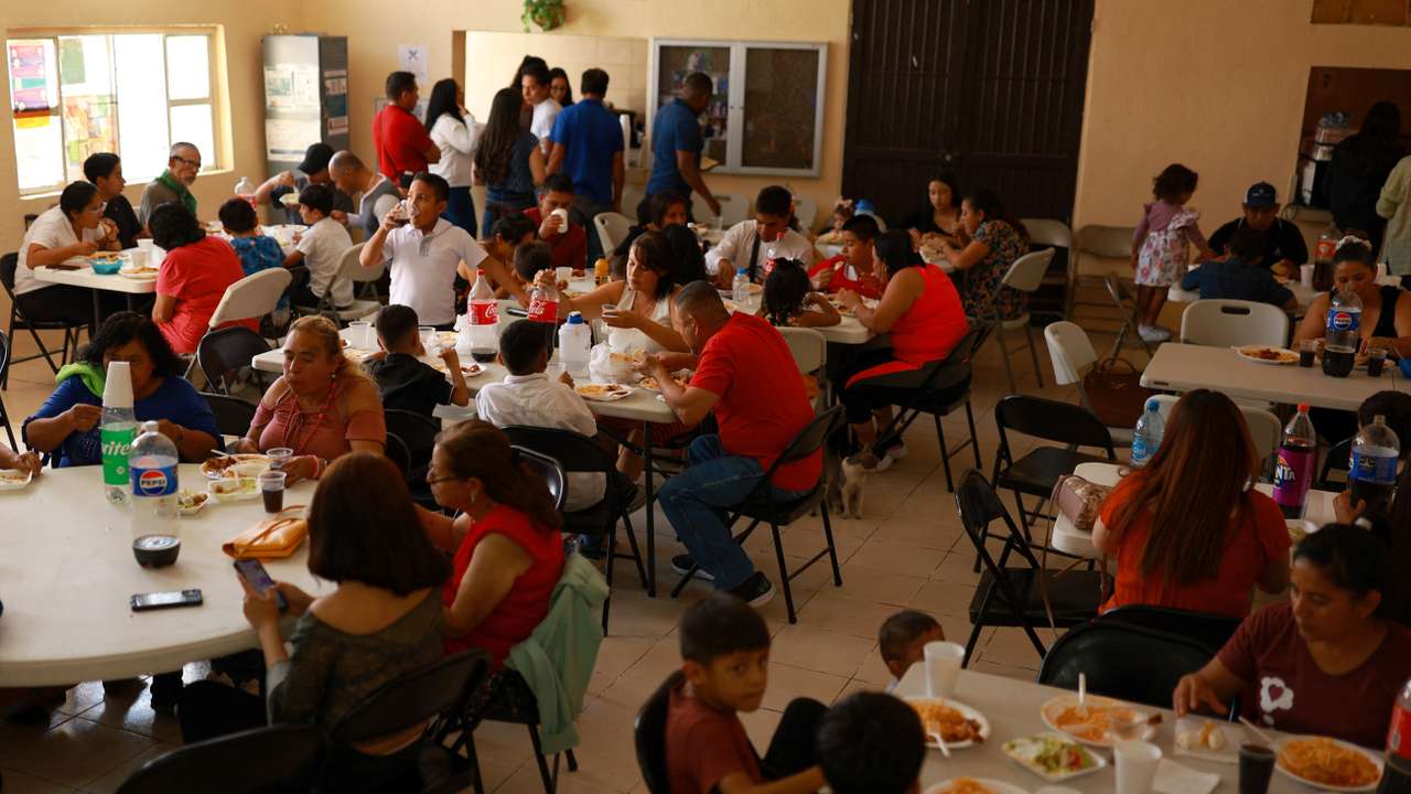 Asylum seekers in Ciudad Juarez after U.S. President Joe Biden announced a sweeping border security enforcement effort