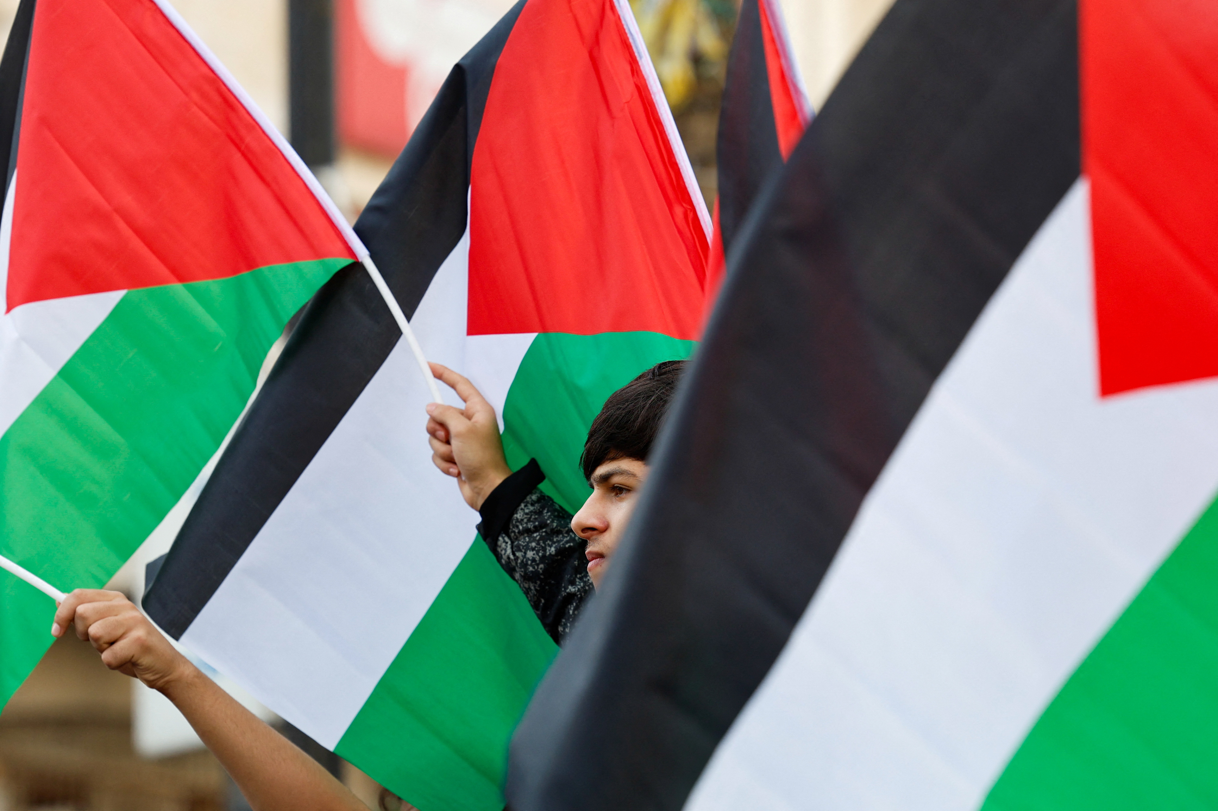 People hold a demonstration demanding the release of Palestinians held in Israeli prisons, in Ramallah