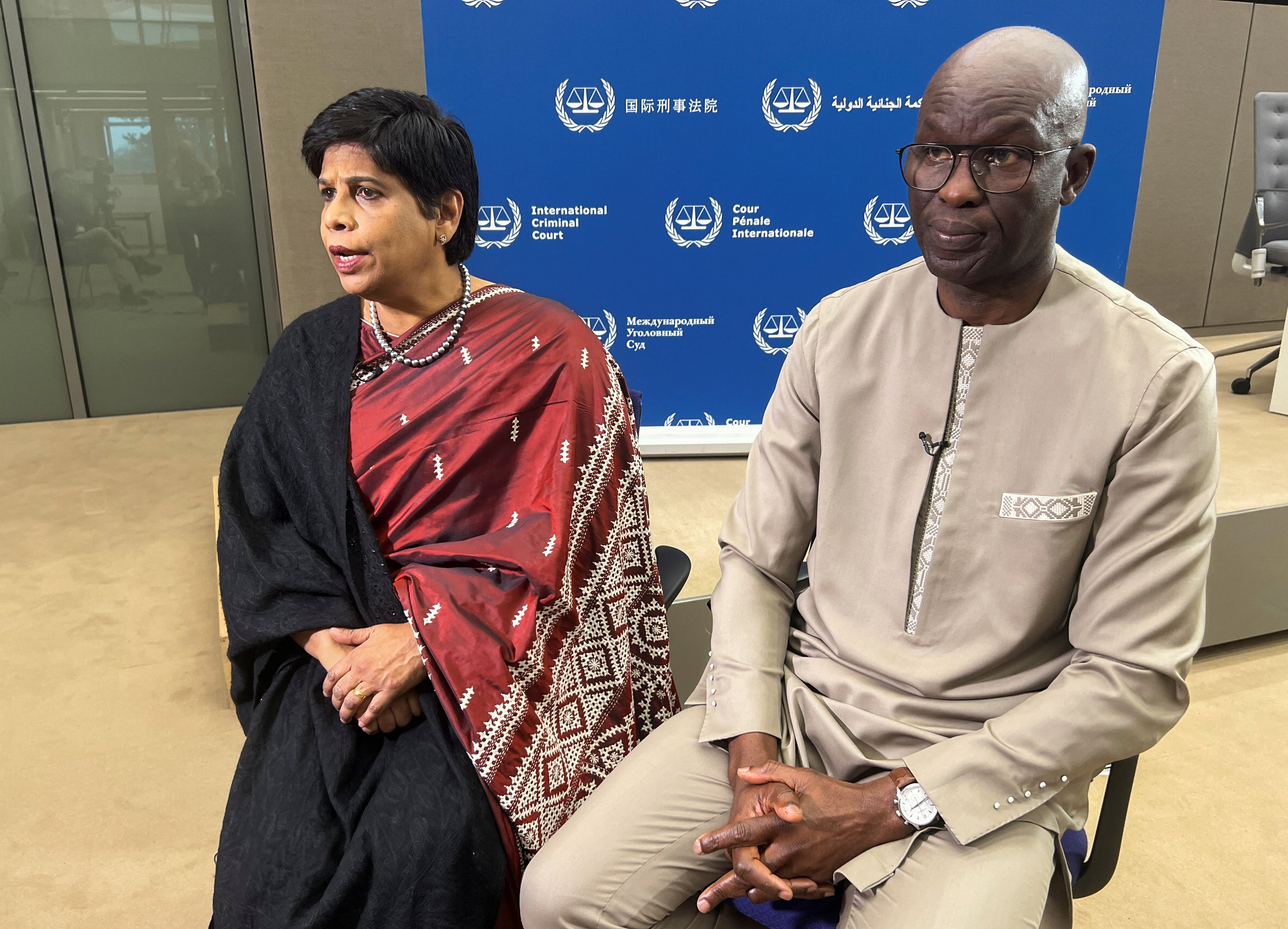 ICC Deputy Prosecutor Khan and Acting Chief Prosecutor attend an interview with Reuters in The Hague