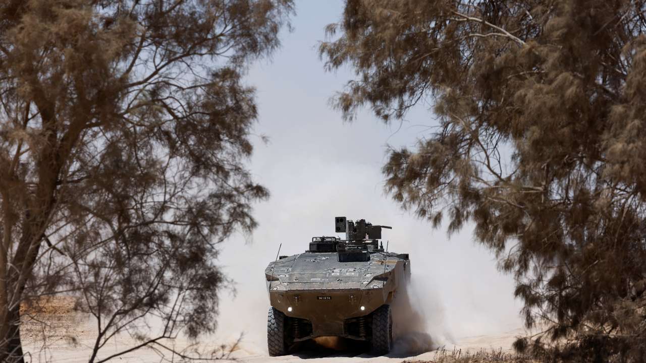 An Israeli military vehicle manoeuvres near the Israel-Gaza border