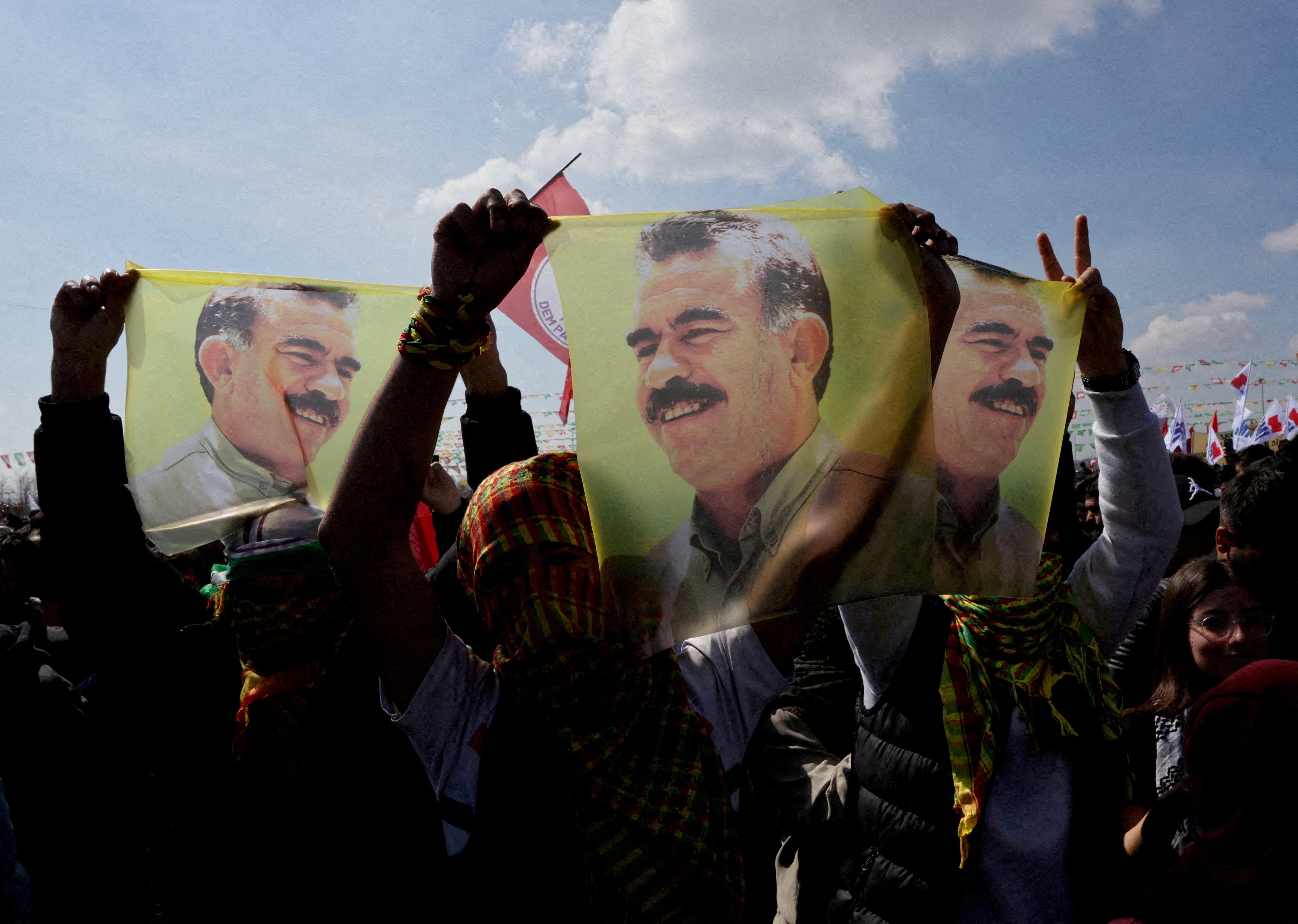 FILE PHOTO: FILE PHOTO: FILE PHOTO: Pro-Kurdish party supporters display flags with portrait of jailed PKK leader Abdullah Ocalan