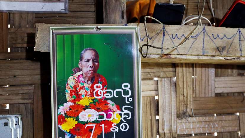 A picture of Pe Kha Lau hangs at Phop Phra district