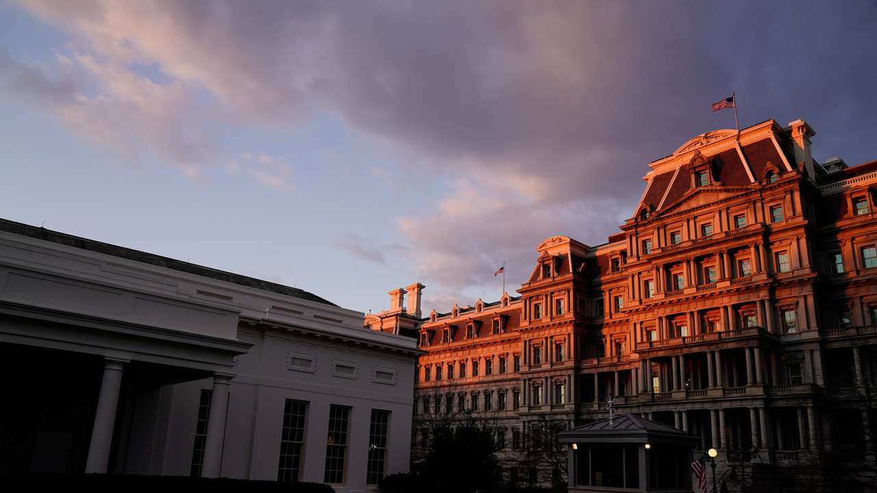 The West Wing of the White House and the Eisenhower Executive Office Building are seen at sunrise during U.S. President Biden and Vice President Harris' first week in office in Washington