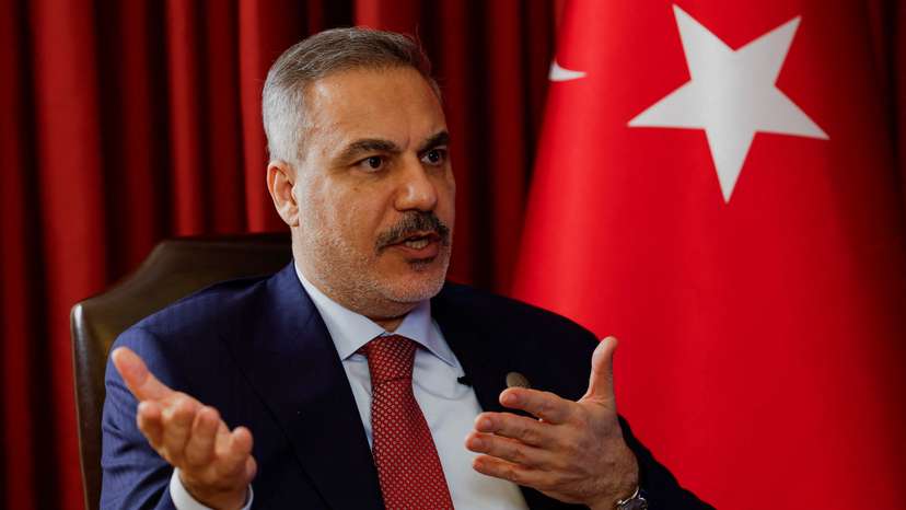 Turkish Foreign Minister Hakan Fidan speaks during an interview with Reuters at the 23rd edition of the annual Doha Forum, in Doha