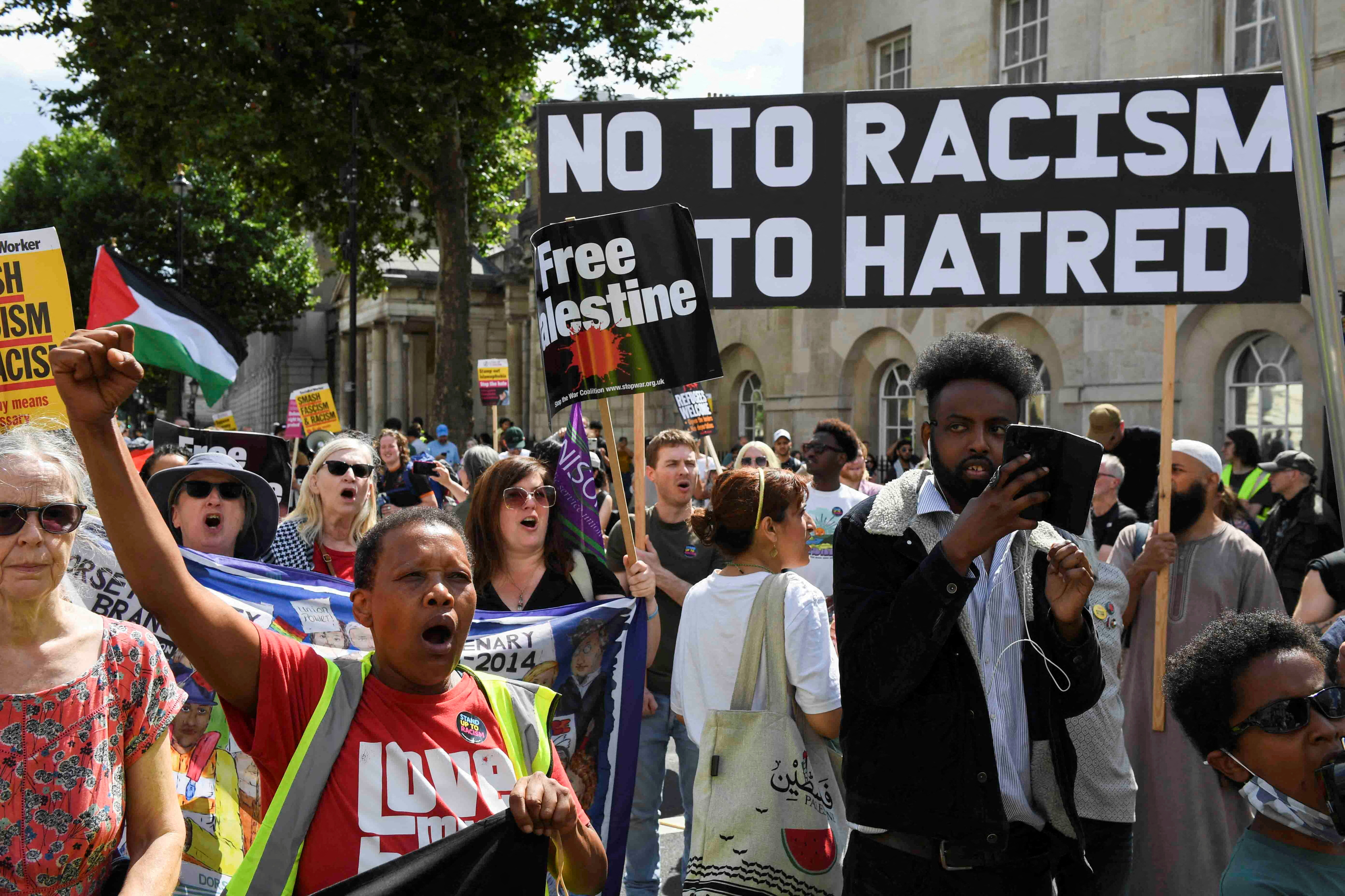 FILE PHOTO: Counter-protesters against Tommy Robinson attend a march organised by Stand Up To Racism and other groups, in London