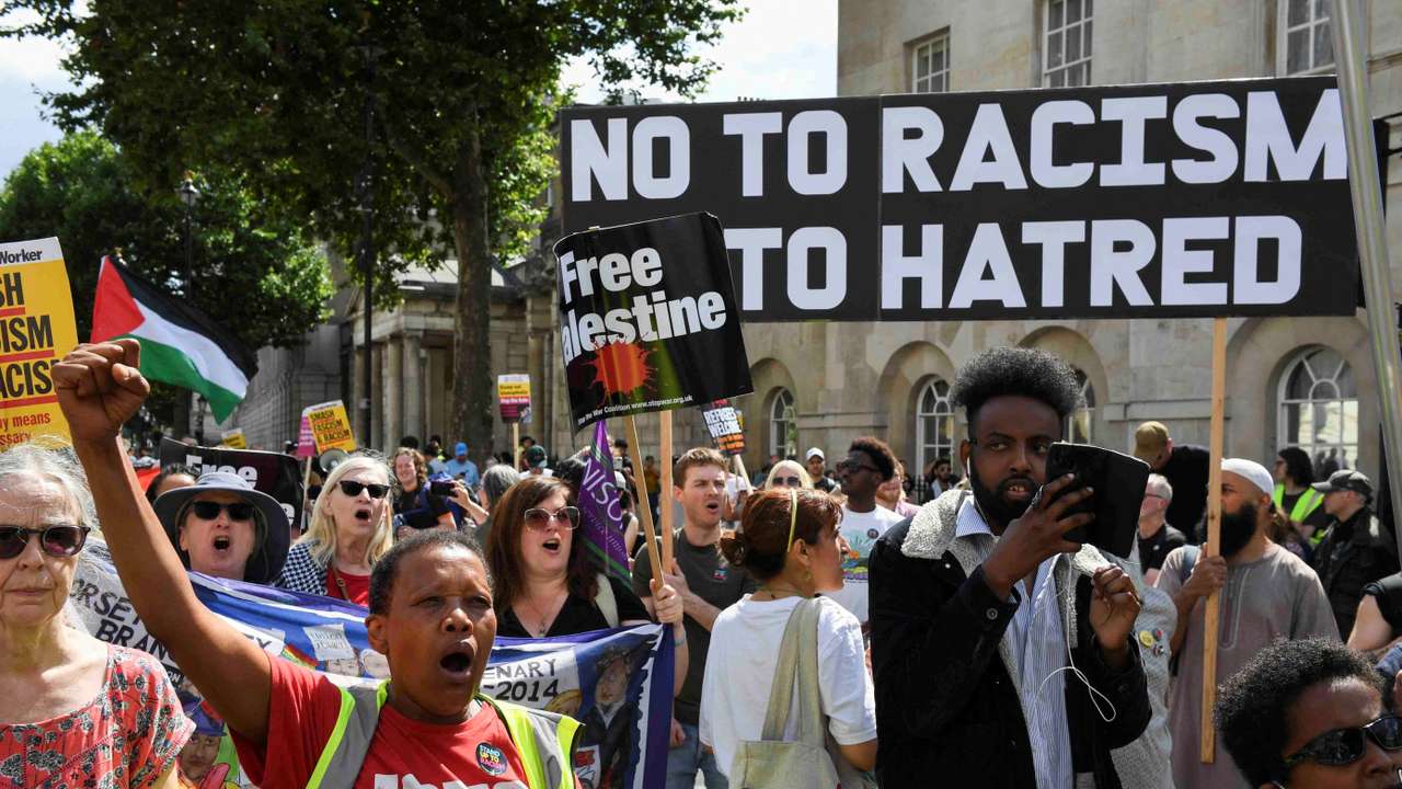 FILE PHOTO: Counter-protesters against Tommy Robinson attend a march organised by Stand Up To Racism and other groups, in London