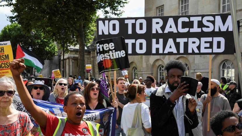 FILE PHOTO: Counter-protesters against Tommy Robinson attend a march organised by Stand Up To Racism and other groups, in London