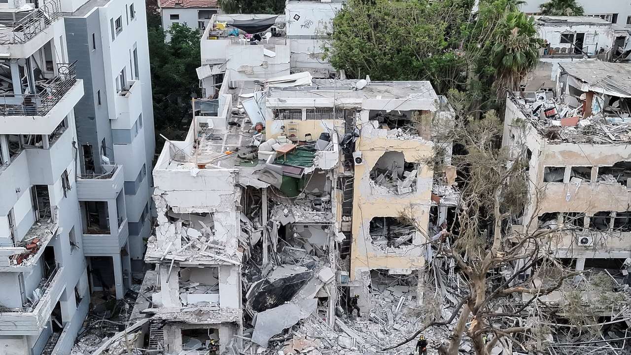 A drone photo shows the damage over residential homes at the impact site following missile attack from Iran on Israel, in Tel Aviv