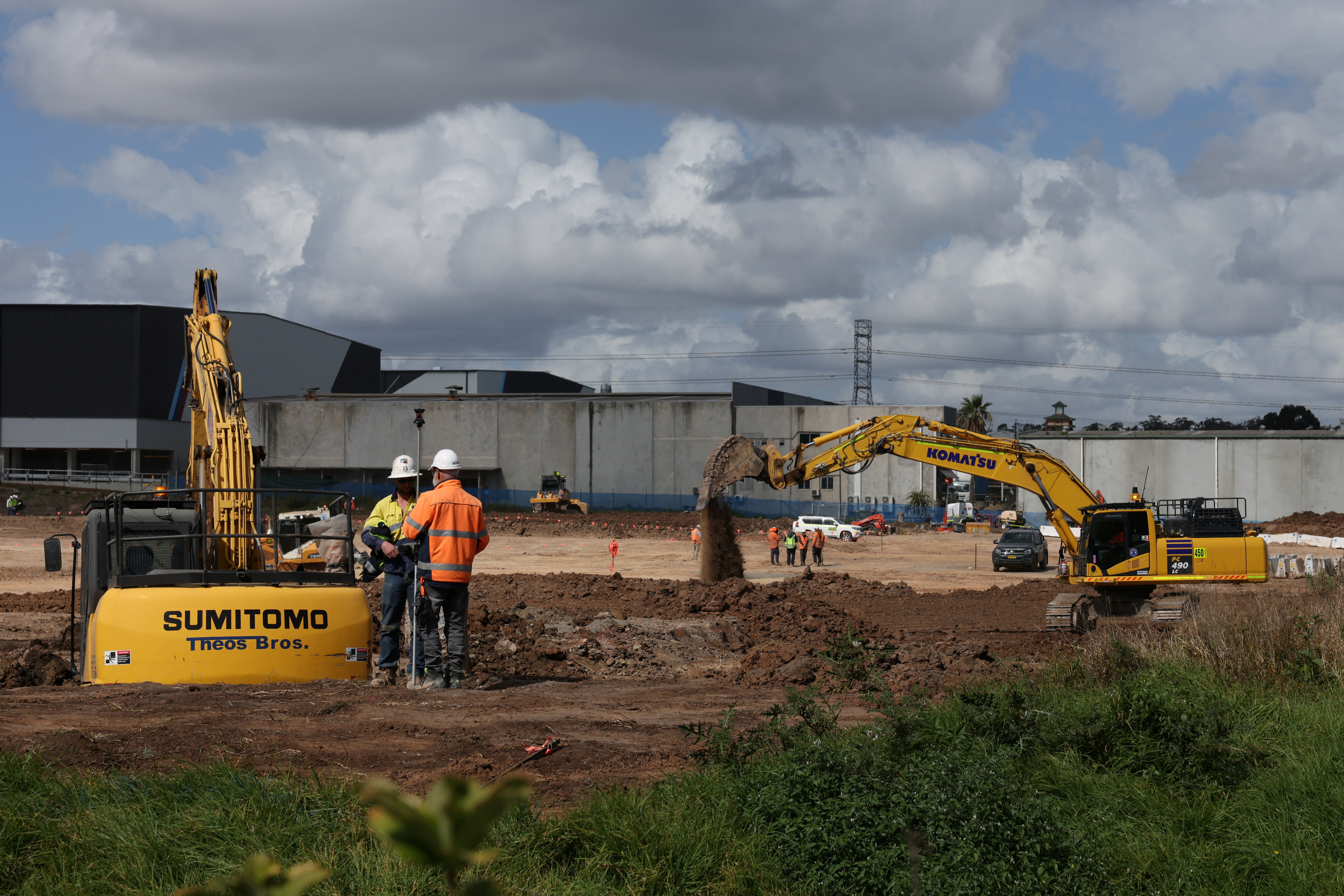 People work at a site of a new Amazon data centre that is under construction in western Sydney