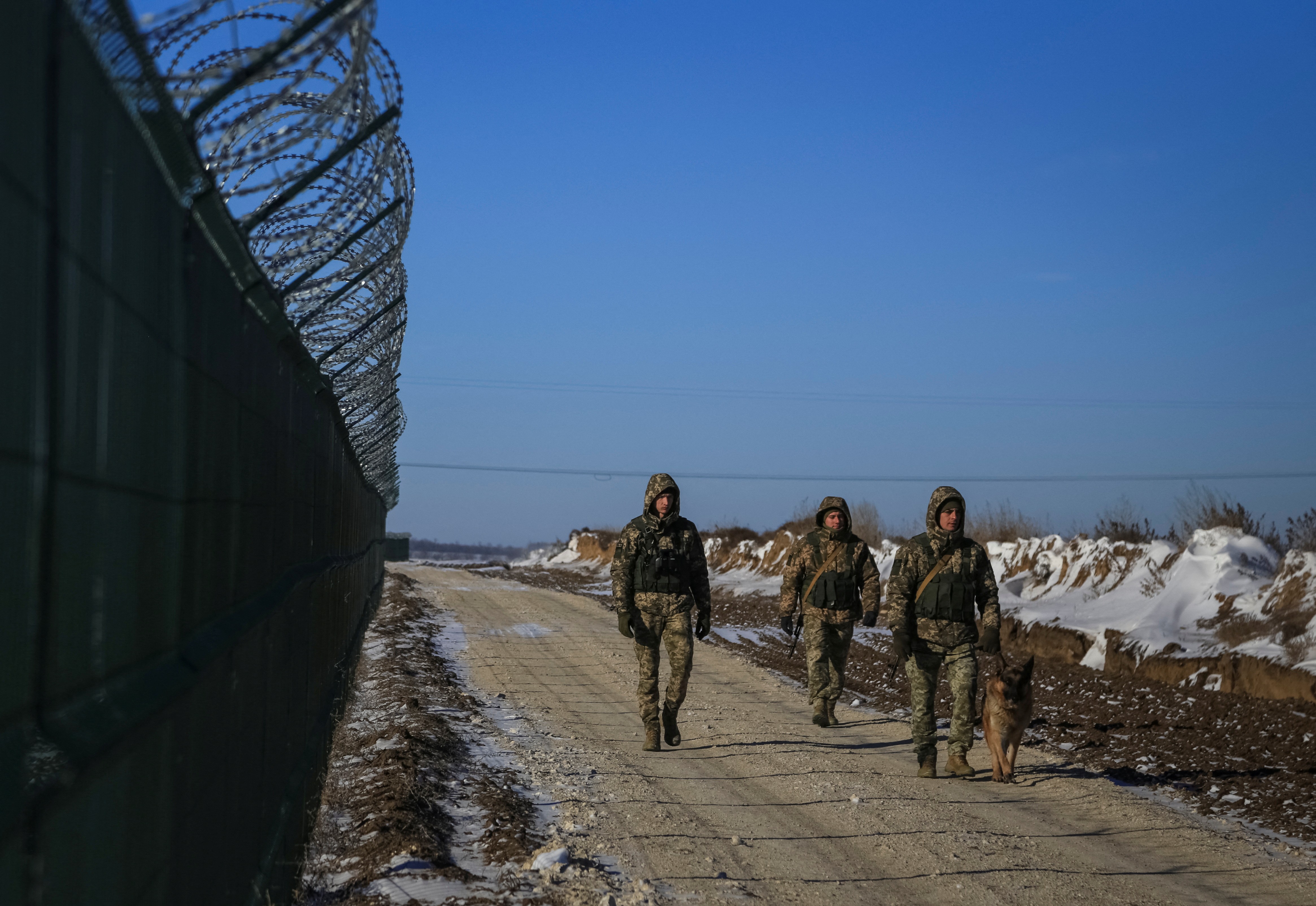 FILE PHOTO: Members of the Ukrainian State Border Guard Service patrol along the Ukraine-Moldova border in Odesa region