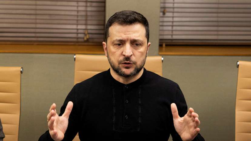 FILE PHOTO: Ukrainian President Volodymyr Zelenskiy speaks during a meeting with members of the media on the outskirts of London