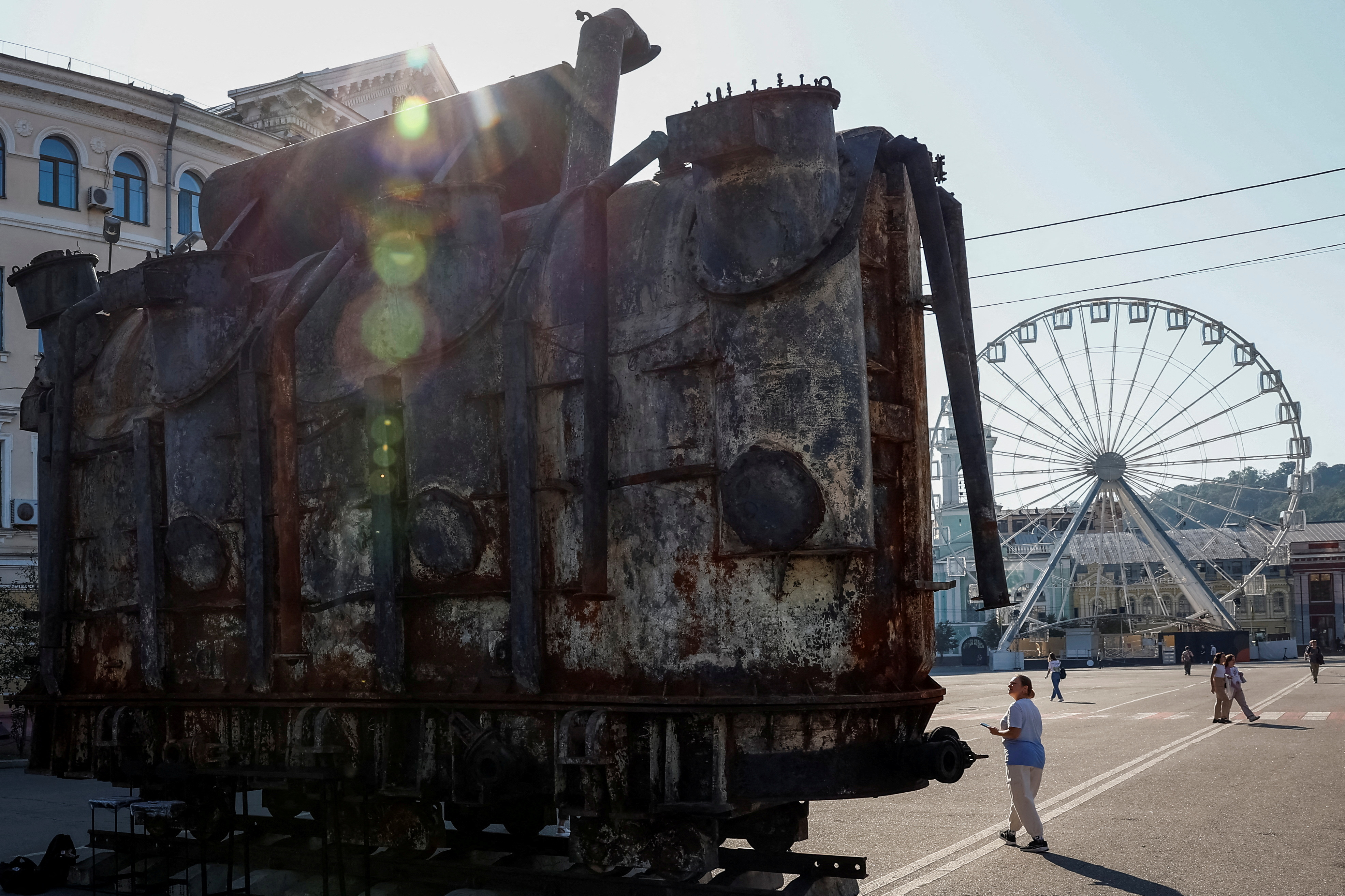 Installation with a power transformer, damaged by a Russian military strike, is seen in the city center in Kyiv