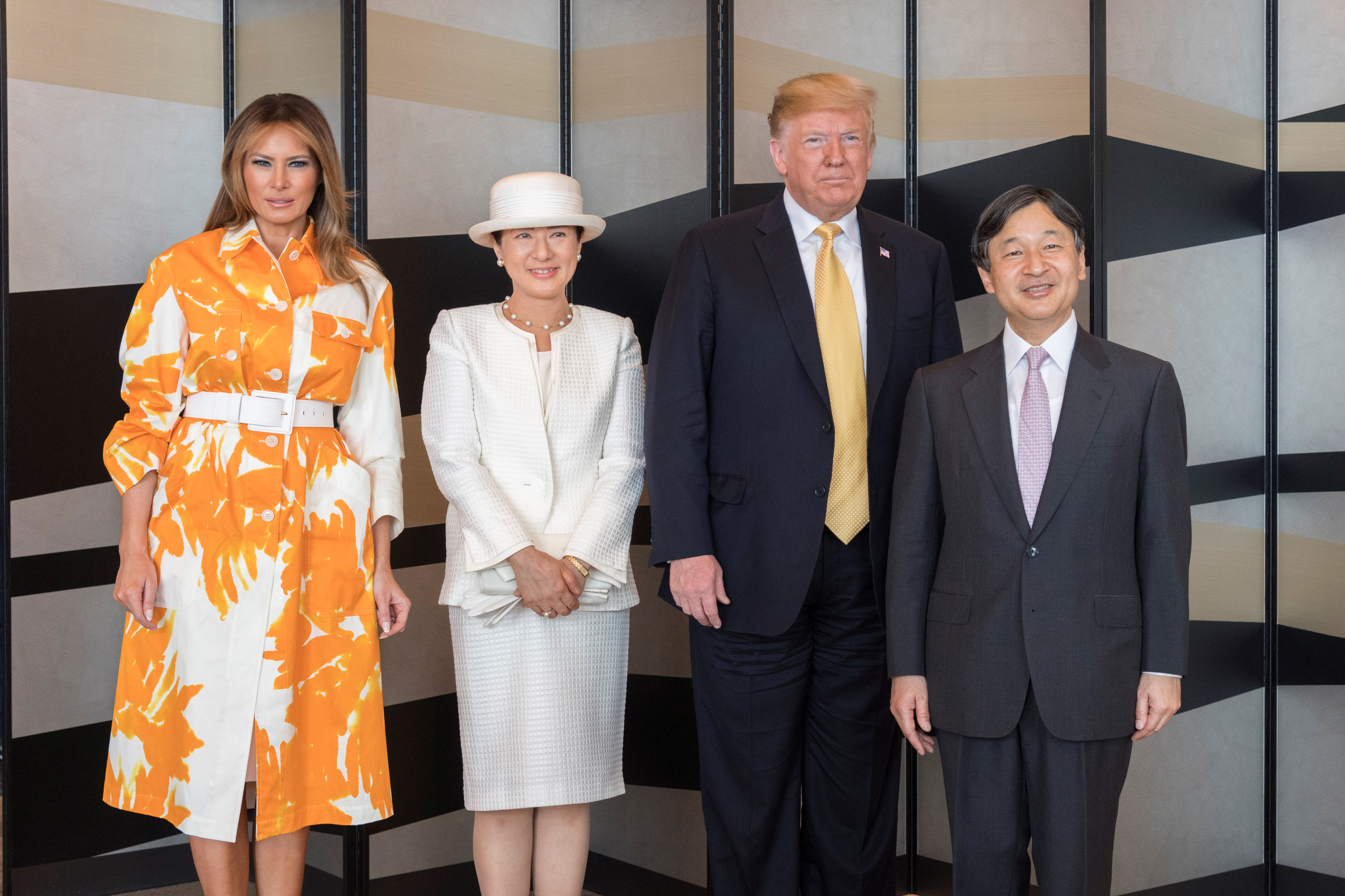 U.S. President Donald Trump and first lady Melania Trump pose for a photograph with Japan's Emperor Naruhito and Empress Masako as they are bid farewell by the Emperor and Empress before their leaving from Japan