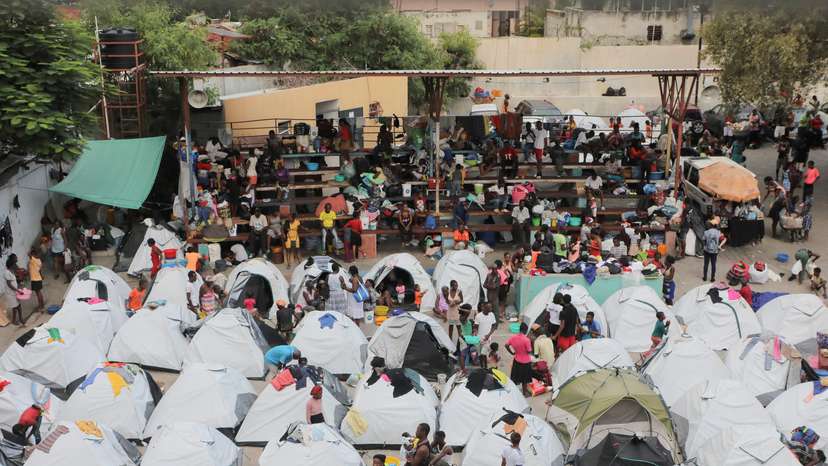 FILE PHOTO: Haitians fleeing gang violence find shelter in a sport arena, in Port-au-Prince