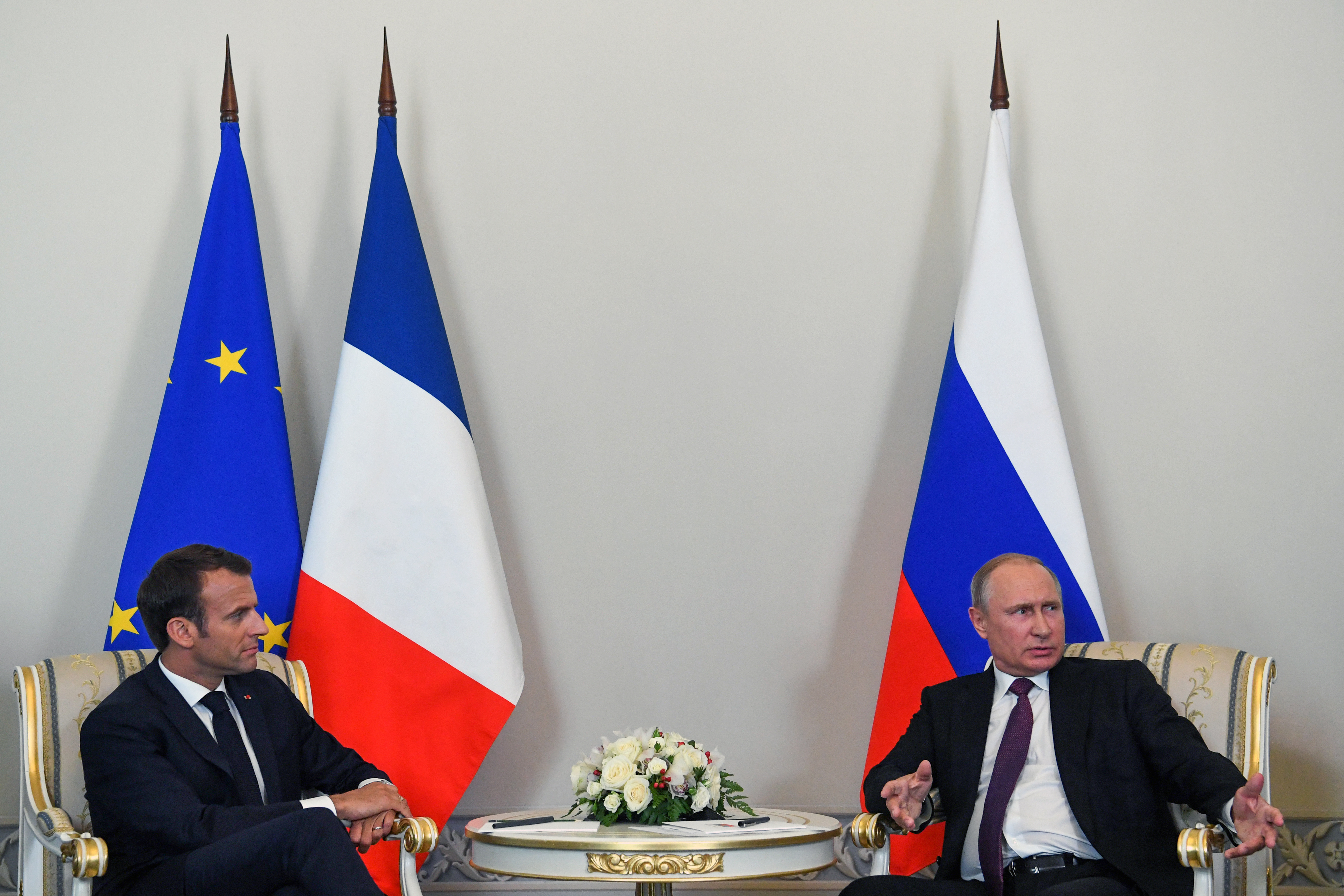 Russian President Putin meets with French President Macron in St. Petersburg