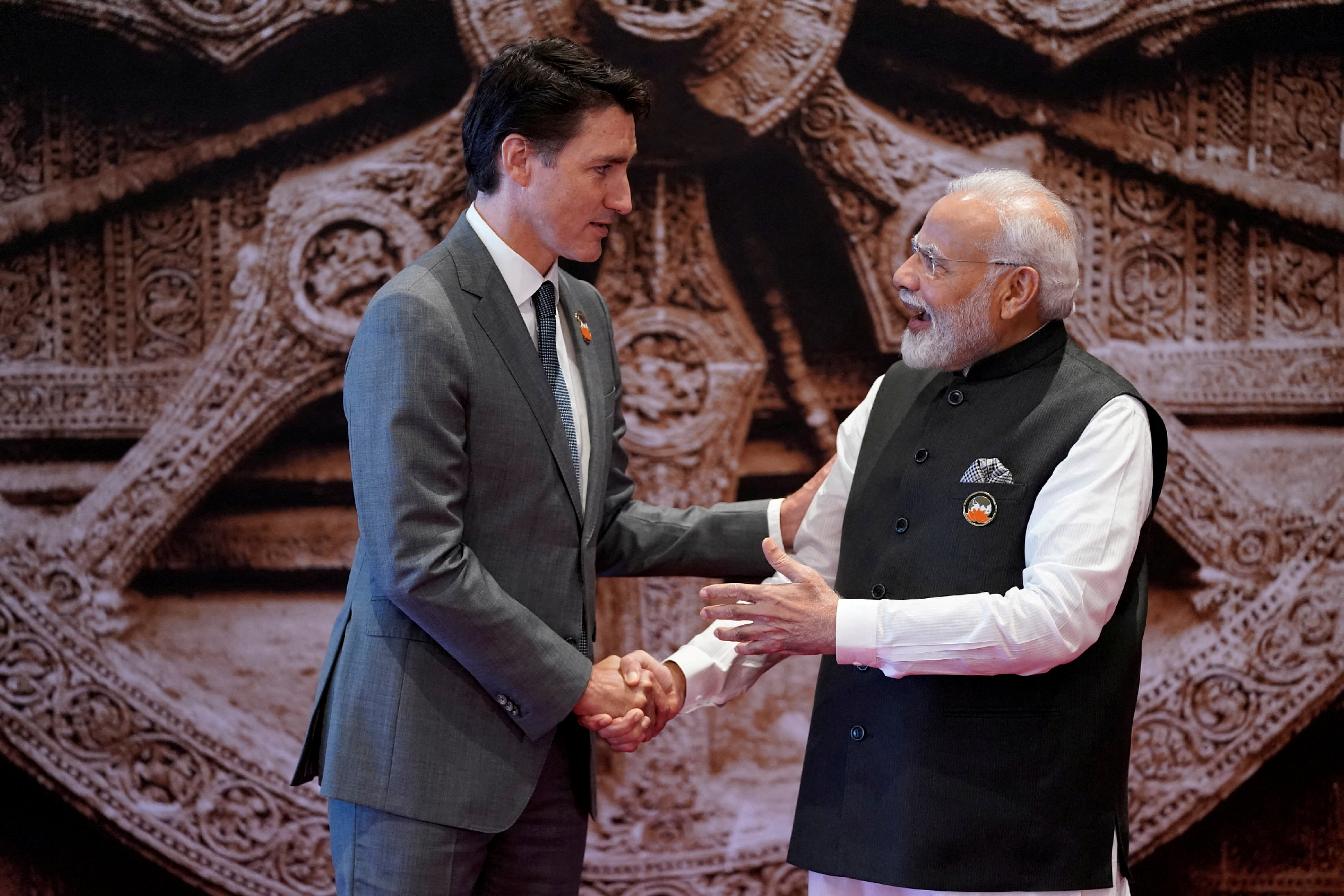FILE PHOTO: Indian Prime Minister Narendra Modi welcomes Canada Prime Minister Justin Trudeau at the G20 summit in India