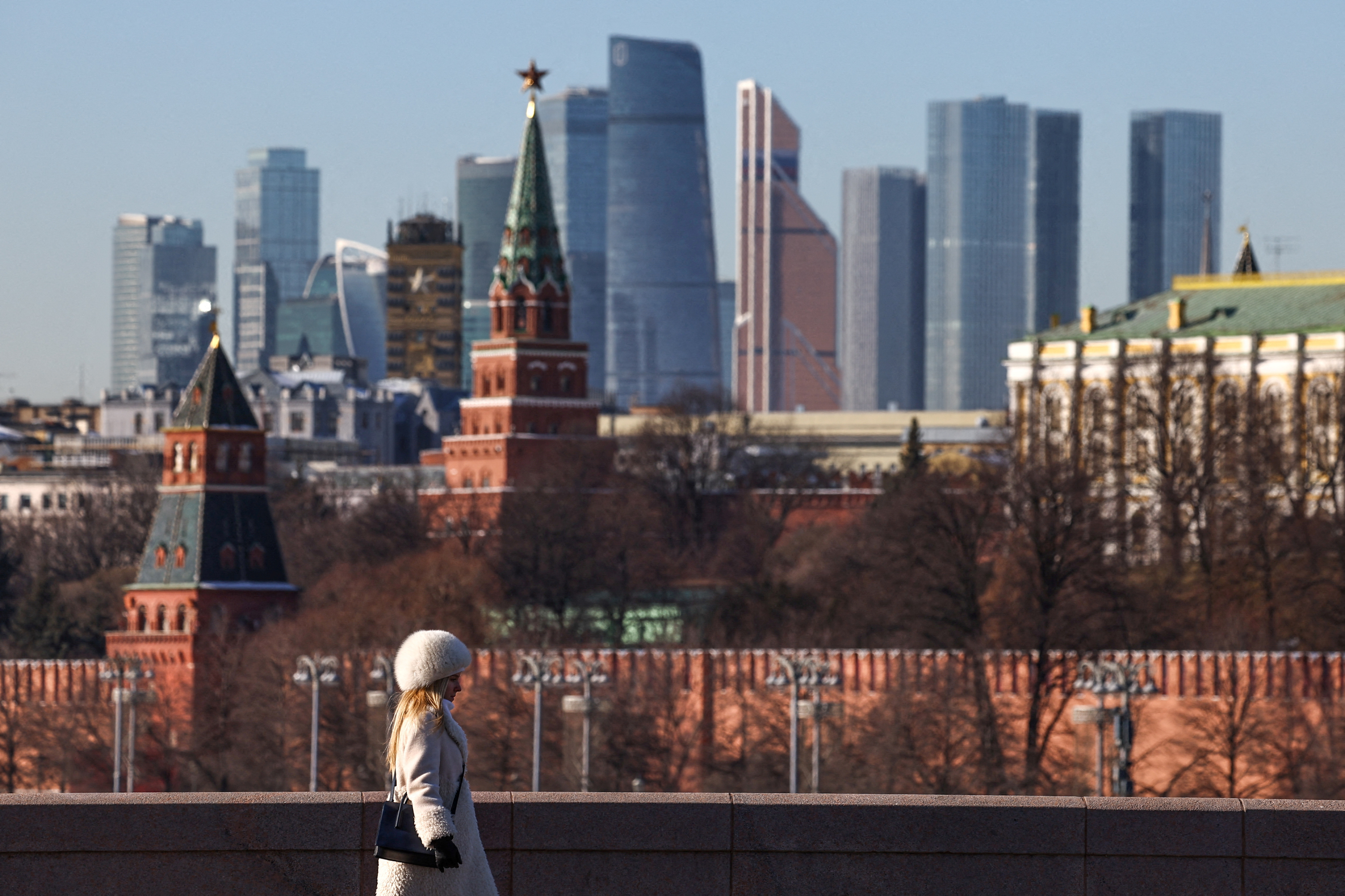 FILE PHOTO: A view shows the Moscow City business centre behind the Kremlin wall in Moscow