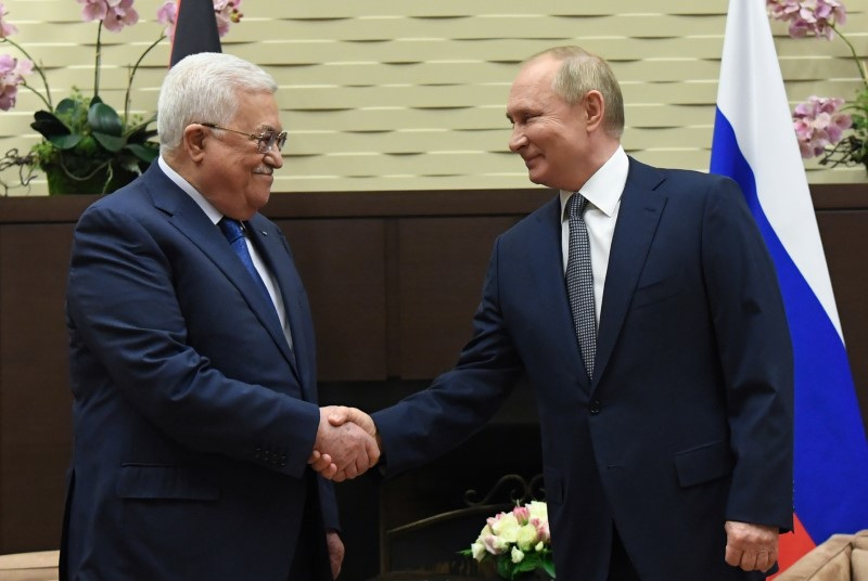 Russian President Vladimir Putin meets with Palestinian President Mahmoud Abbas in Sochi