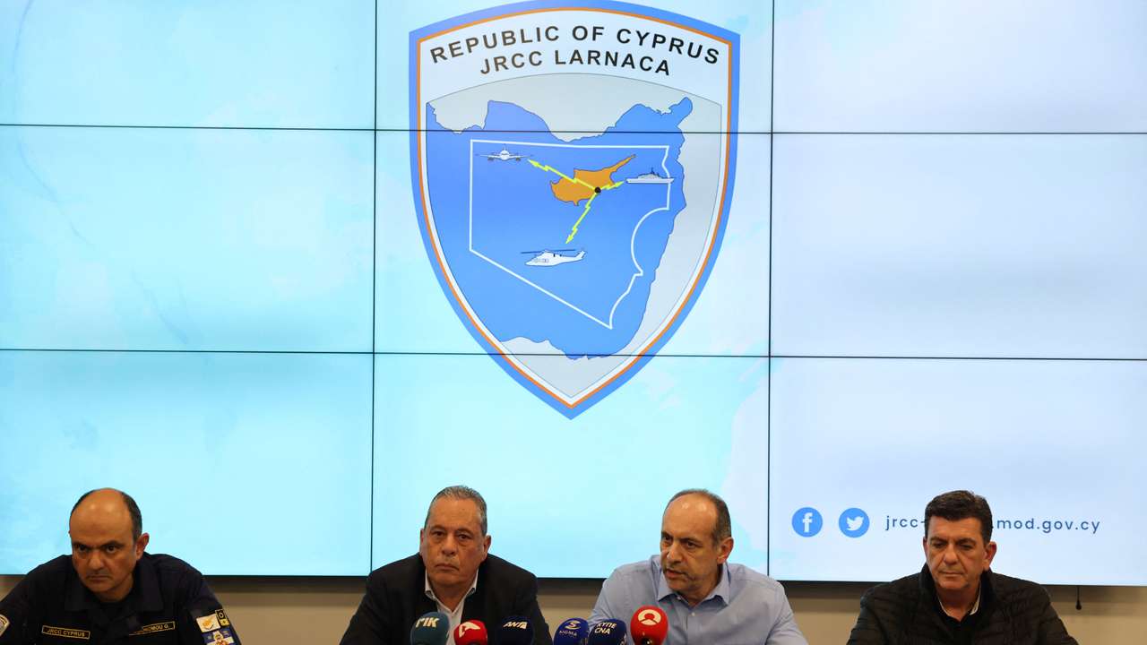 Cyprus Defence Minister Vasilis Palmas and Minister of Justice and Public Order Marios Hartsiotis speak during a press conference at the Joint Rescue Coordination Center "Zenon" in Larnaca