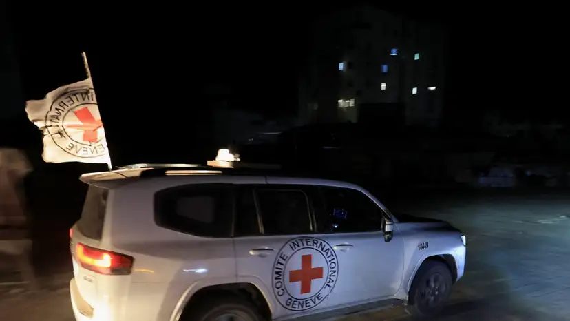 Red Cross transports the body of a deceased hostage after it was handed over by Hamas militants as part of a ceasefire and a hostages-prisoners swap deal between Hamas and Israel, in Gaza City