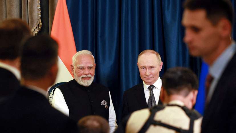 FILE PHOTO: Russian President Putin and Indian Prime Minister Modi meet at SCO summit in Tianjin