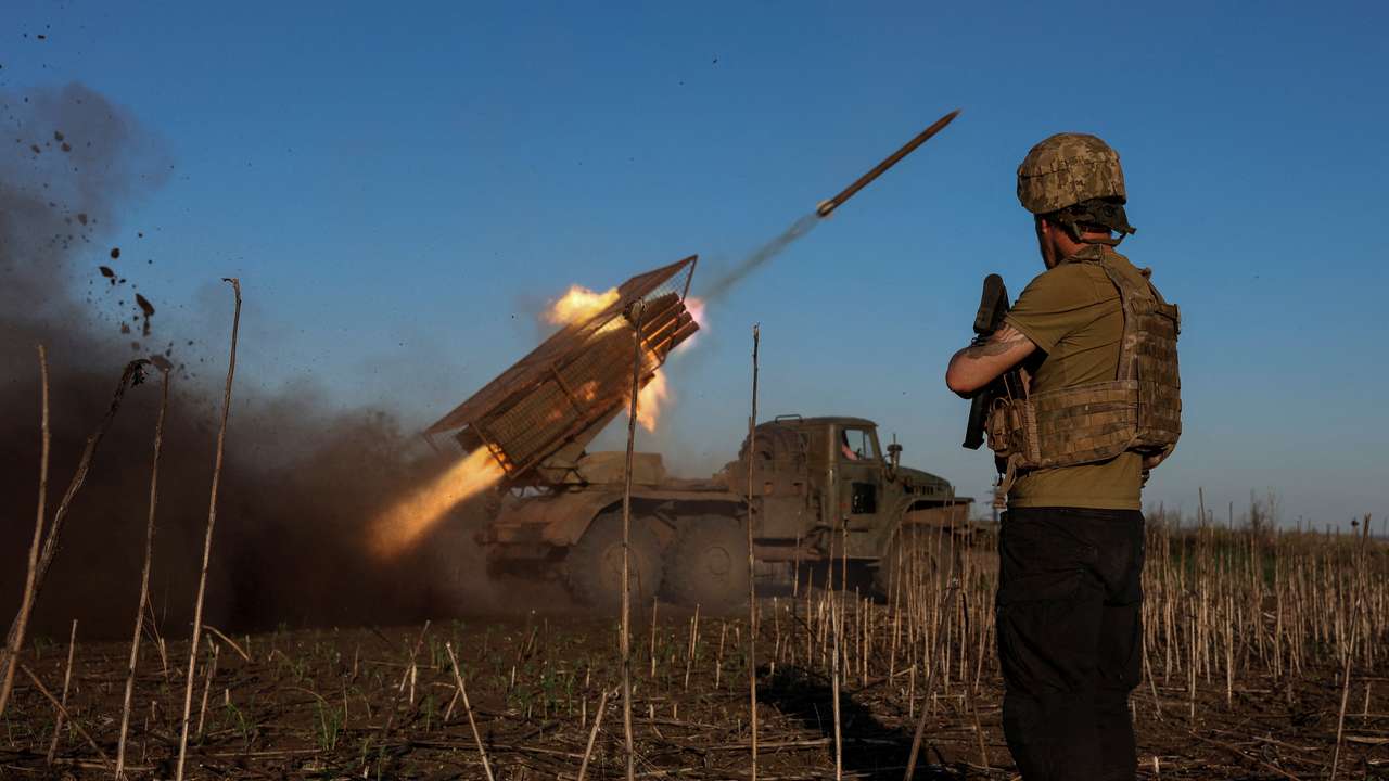 Ukrainian servicemen fire a Grad MLRS towards Russian troops near the frontline town of Pokrovsk