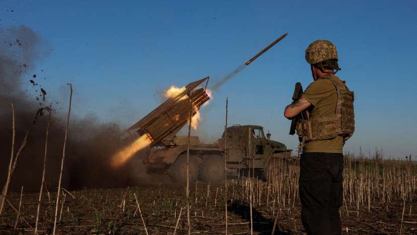 Ukrainian servicemen fire a Grad MLRS towards Russian troops near the frontline town of Pokrovsk