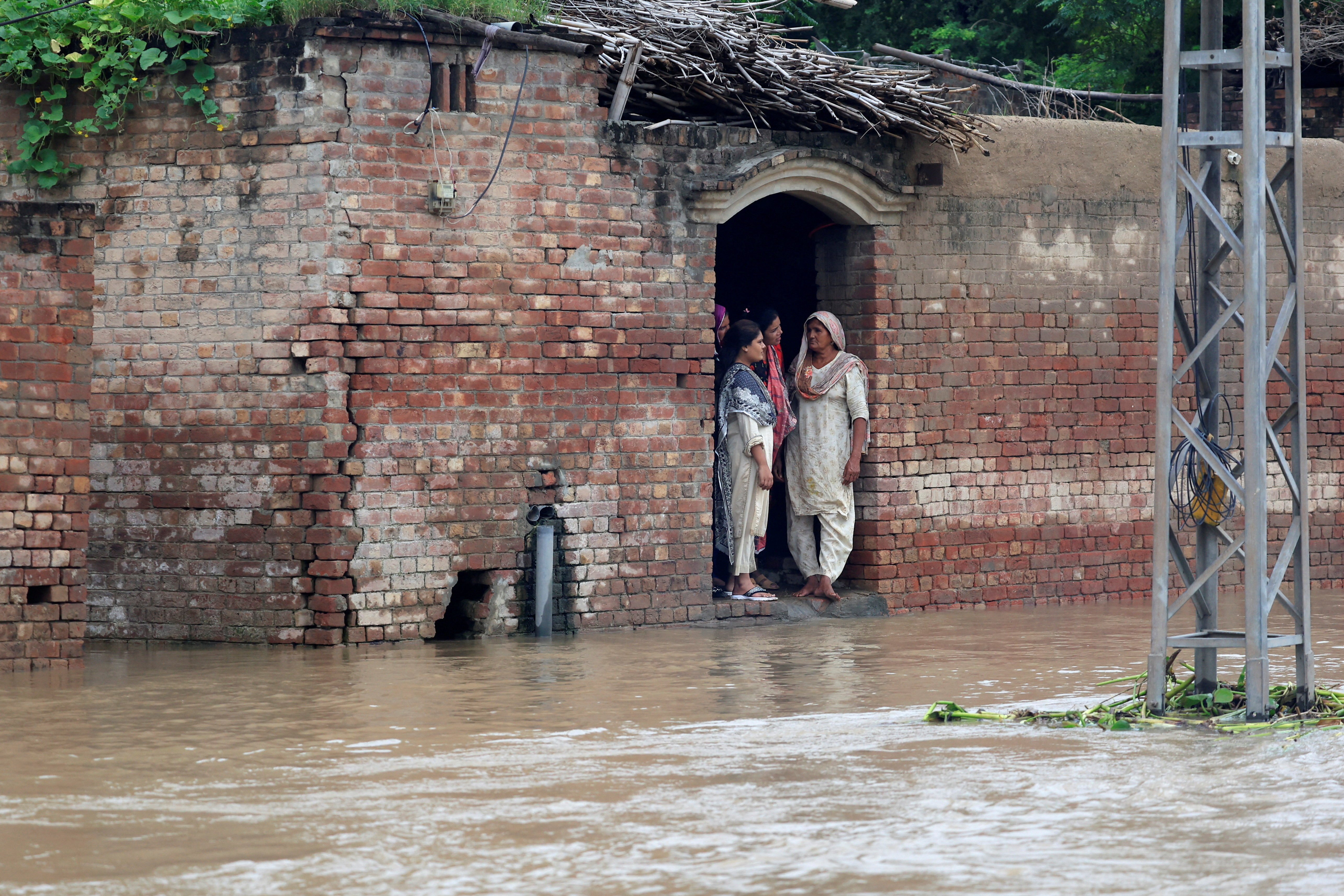 Monsoon rains and rising water level of the Sutlej River, in Hakuwala village near the Pakistan-India border in Kasur district