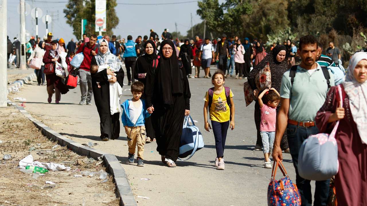 Palestinians fleeing north Gaza move southward, in the central Gaza Strip