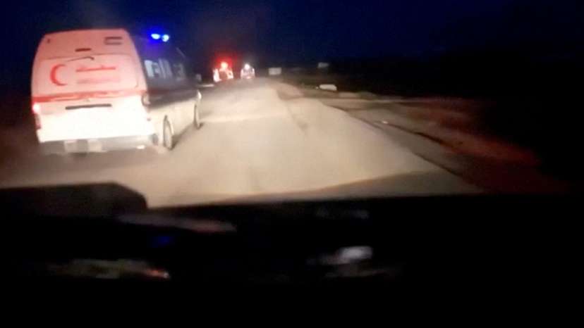 FILE PHOTO: Screenshot from a video published by the Palestinian Red Crescent shows the last moments during the incident in which aid workers were killed in Israeli fire in the southern Gaza Strip