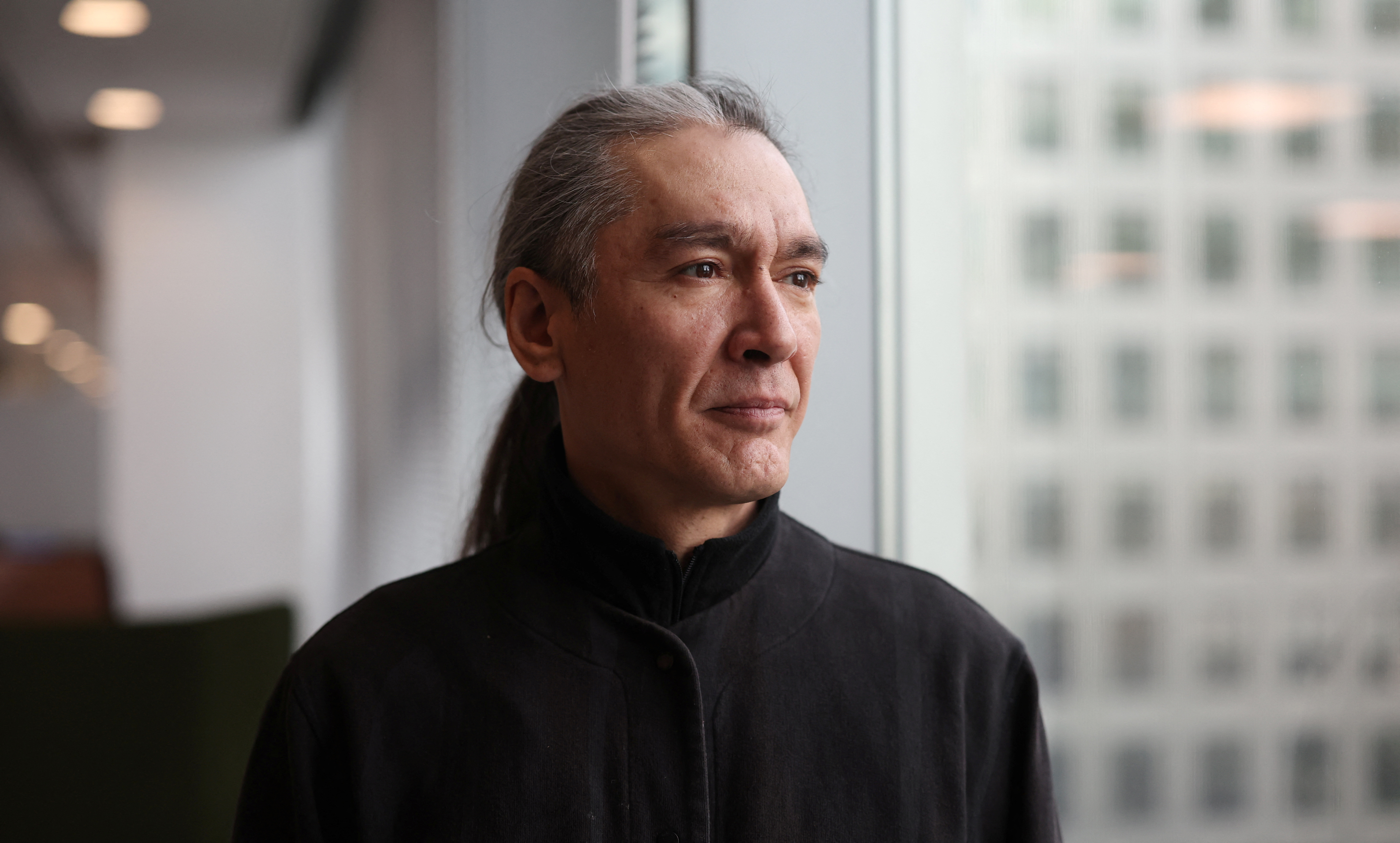 Aris, the son of Aung San Suu Kyi, Myanmar's detained former leader, poses for a portrait in London