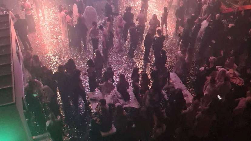 FILE PHOTO: People attend an "almost naked" party at Moscow's Mutabor nightclub