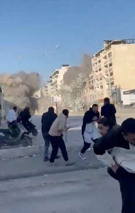 People flee as Israeli strike hits building in Tyre, Lebanon