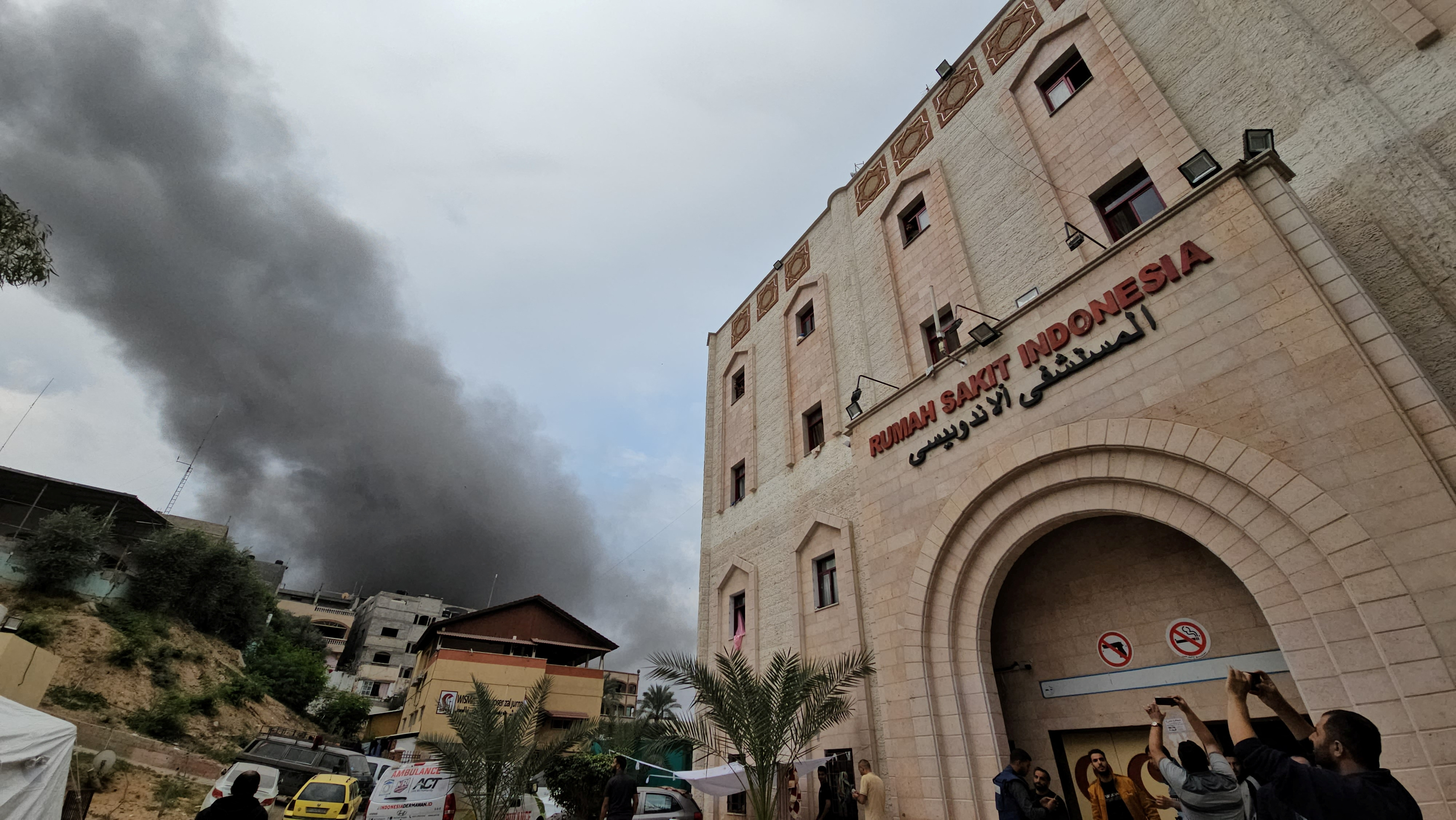 Smoke rises following an Israeli strike near the Indonesian Hospital that ran out of fuel and electricity, in the northern Gaza Strip