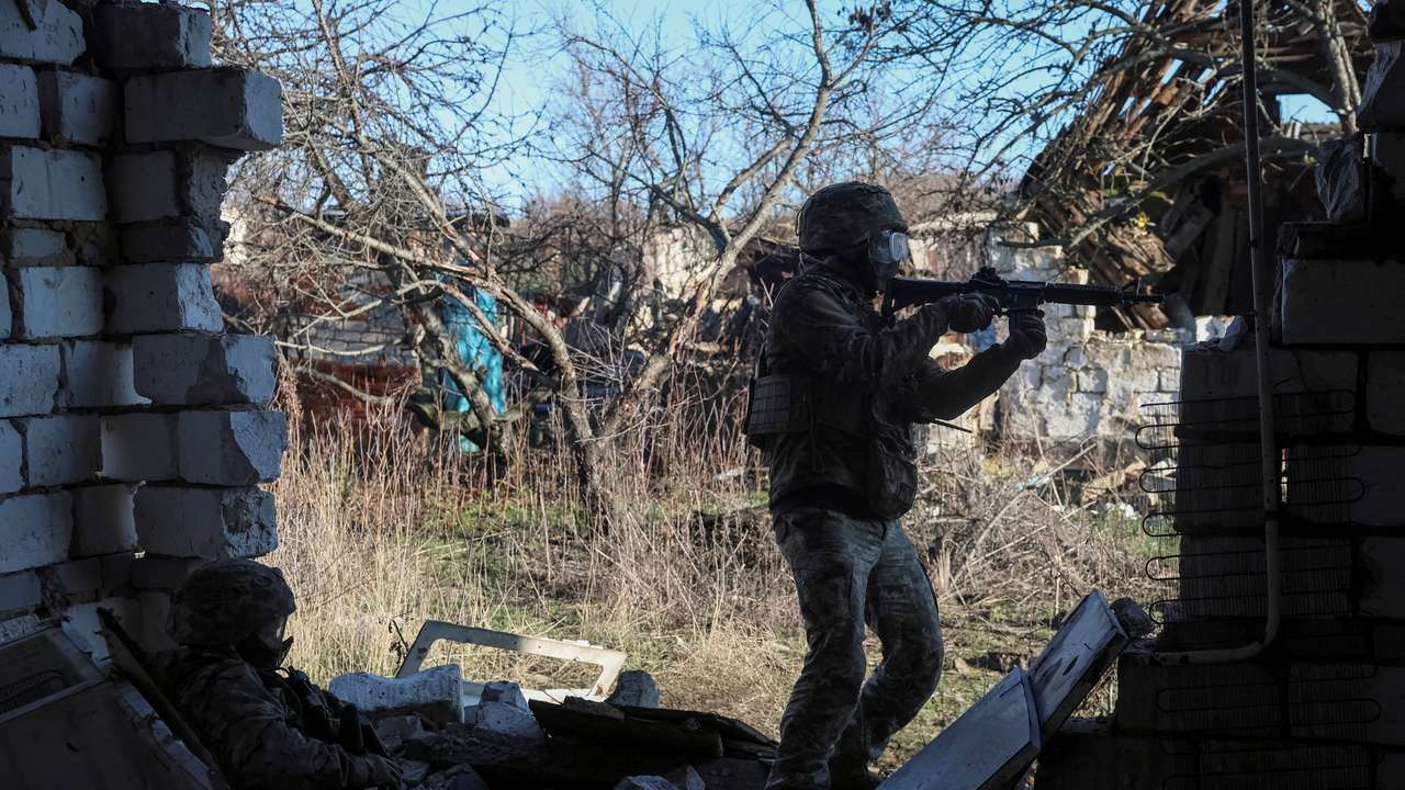 Ukrainian servicemen attend a basic military exercise in Kharkiv region