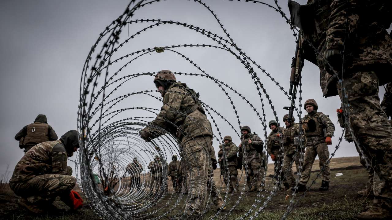 Ukrainian servicemen attend military exercises at a training ground in Donetsk region