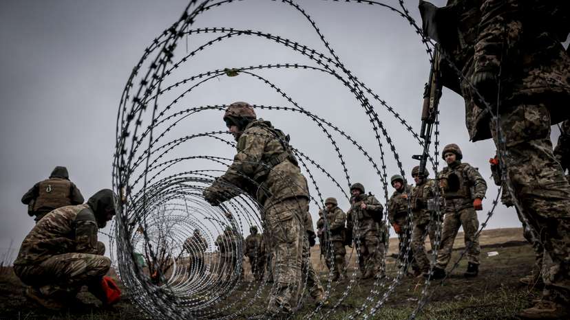 Ukrainian servicemen attend military exercises at a training ground in Donetsk region