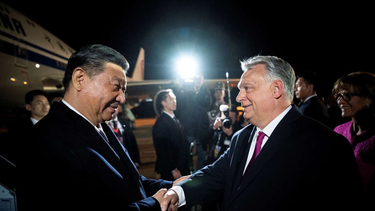Hungarian Prime Minister Orban welcomes Chinese President Xi Jinping at the Ferenc Liszt International Airport in Budapest