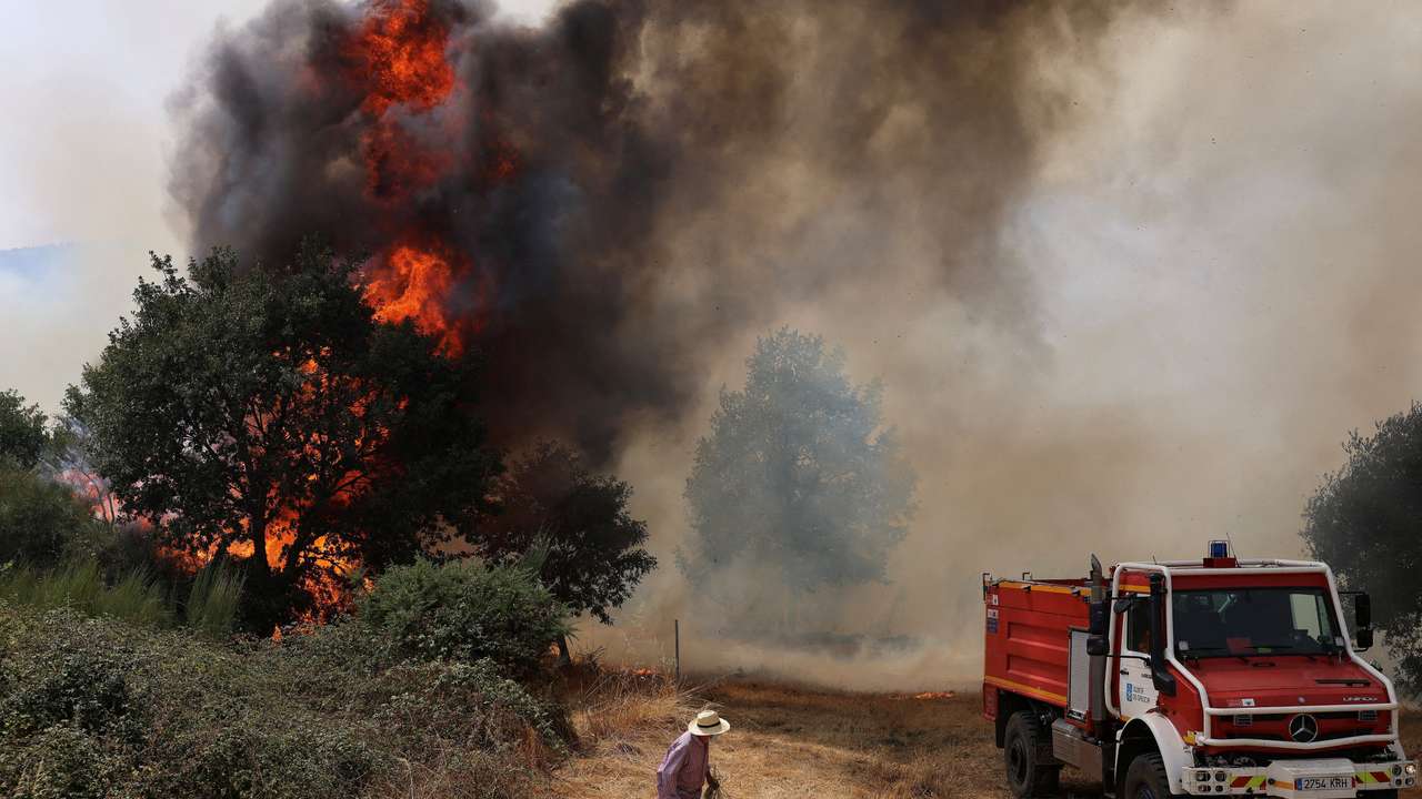 FILE PHOTO: Wildfire rages in Galicia